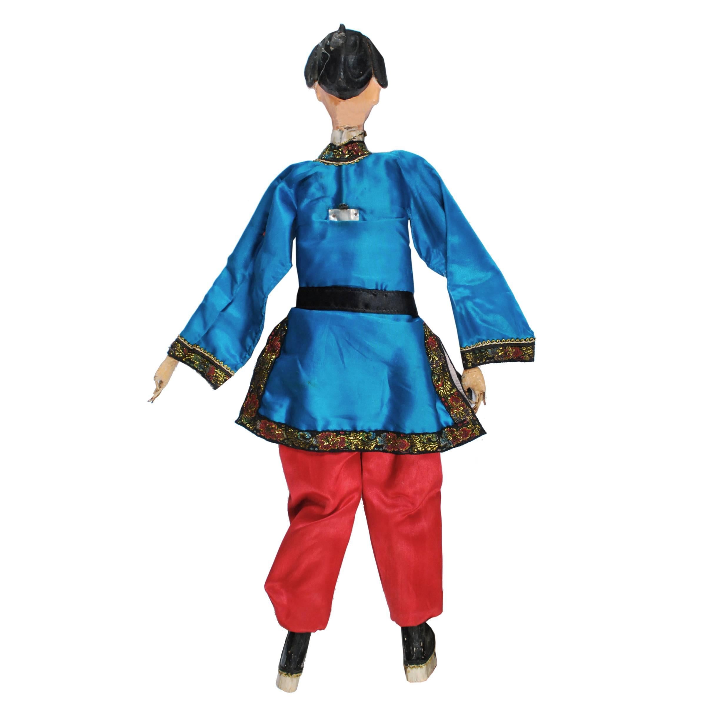 Hand puppets, like this one from China’s Zhejiang region, have been a popular form of entertainment for centuries. In the late 19th early-20th century this tiny robed gentleman probably entertained throngs of people as he strolled the courtyards of