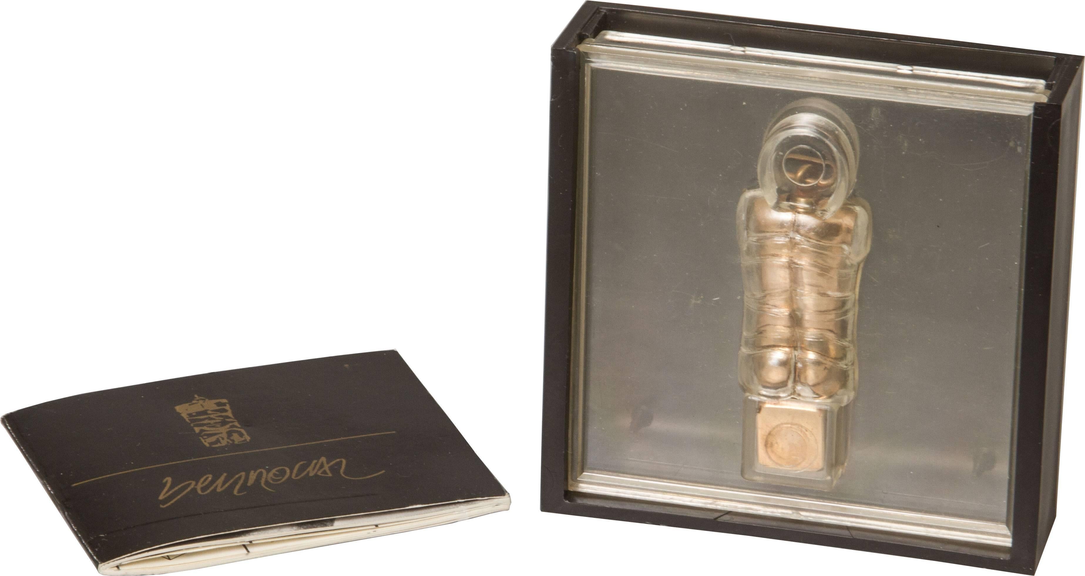 This is Berrocal's micro mini nude male torso puzzle pendant. This has all its original packaging and instruction book.