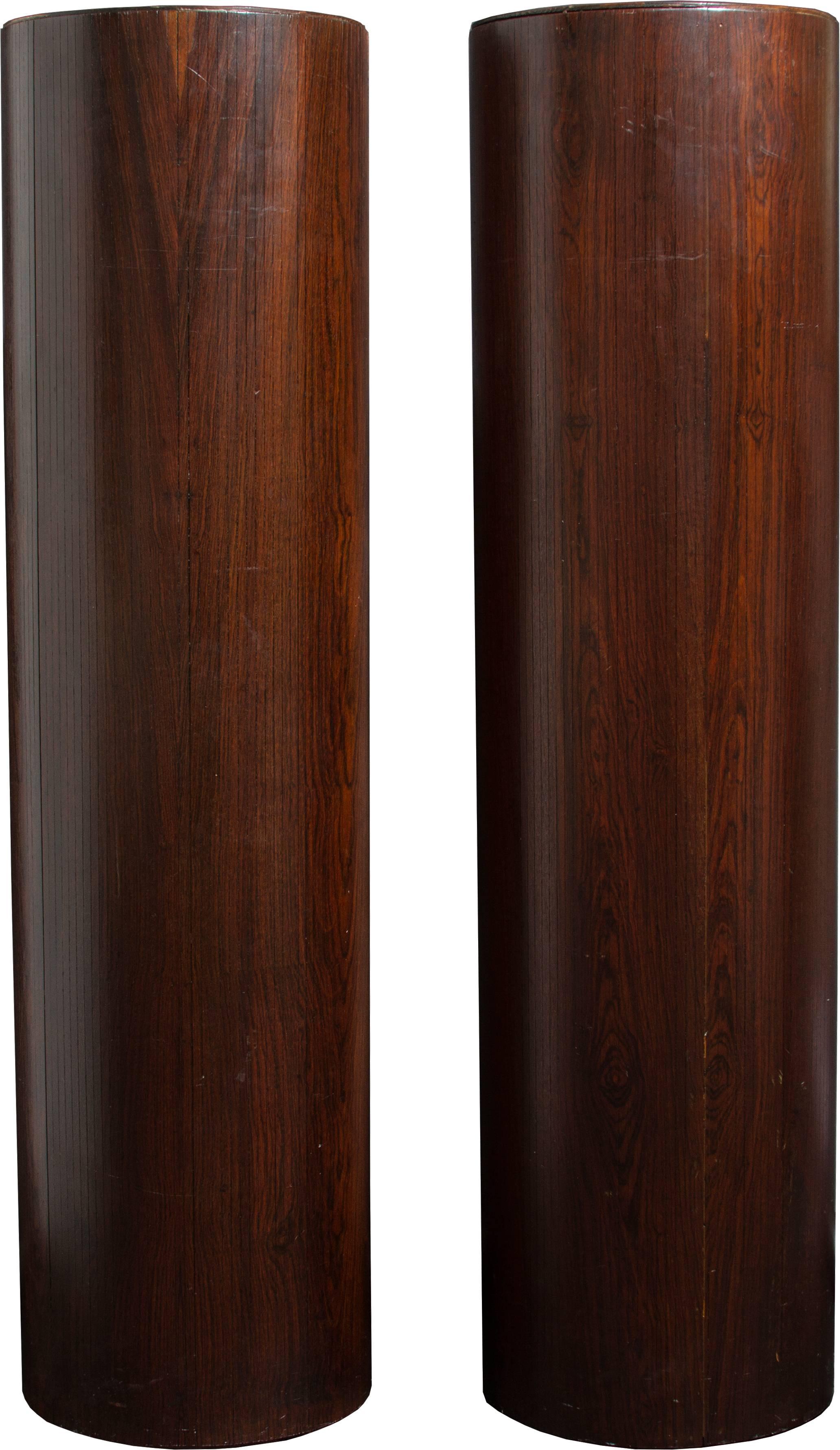 These are a simple and elegant pair of pedestals with a zebrawood veneer.