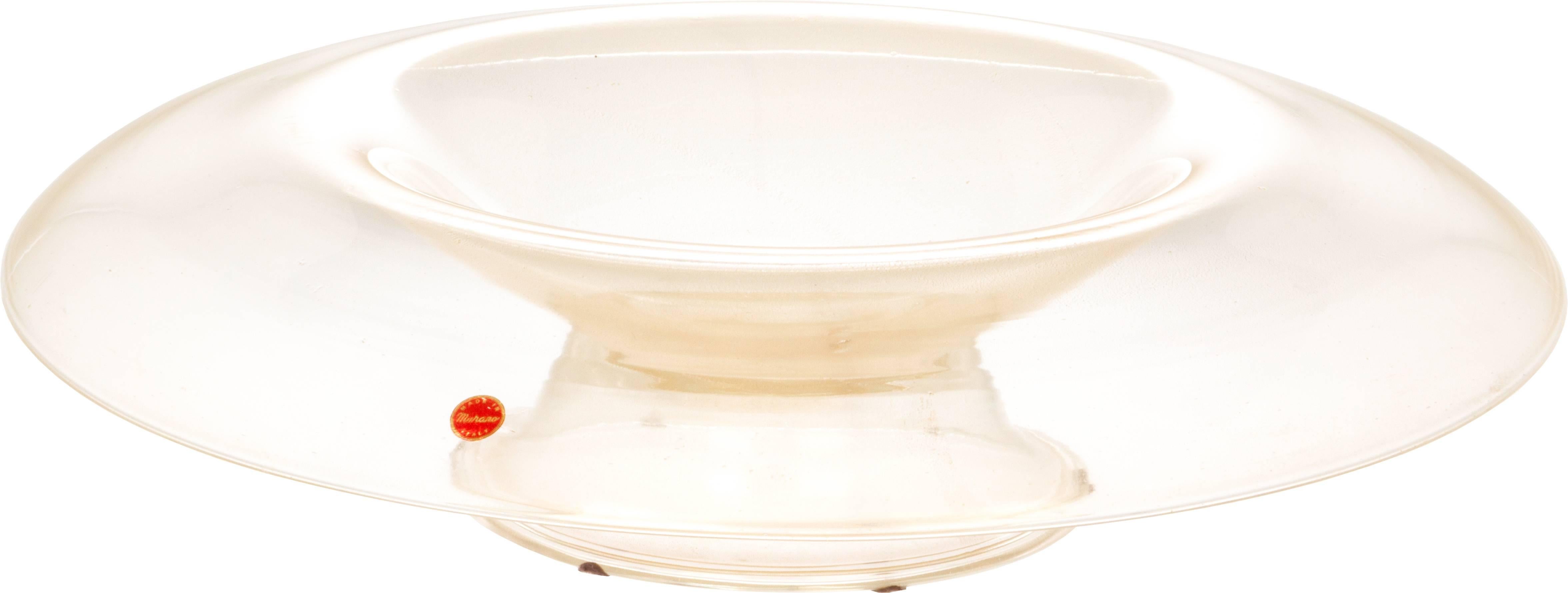 This is an exceptionally large footed centerpiece bowl laced with gold. It has the original label.