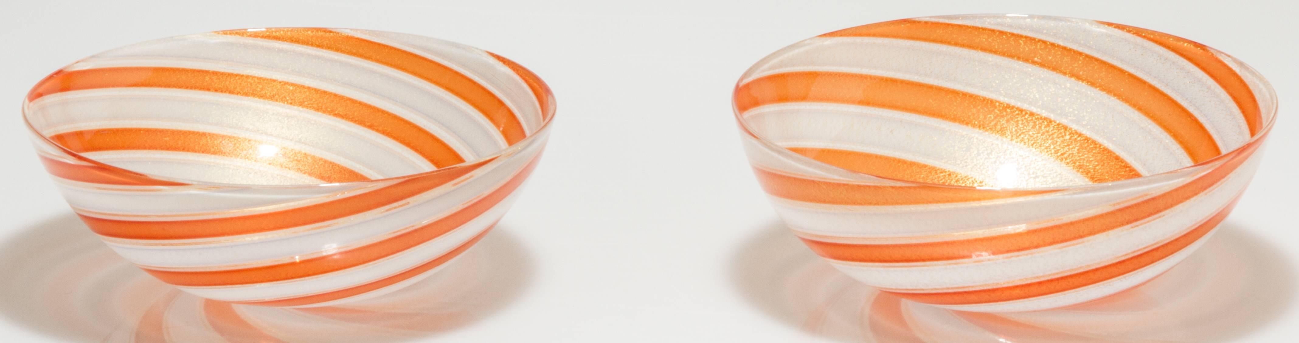 These are very fine blown glass bowls.