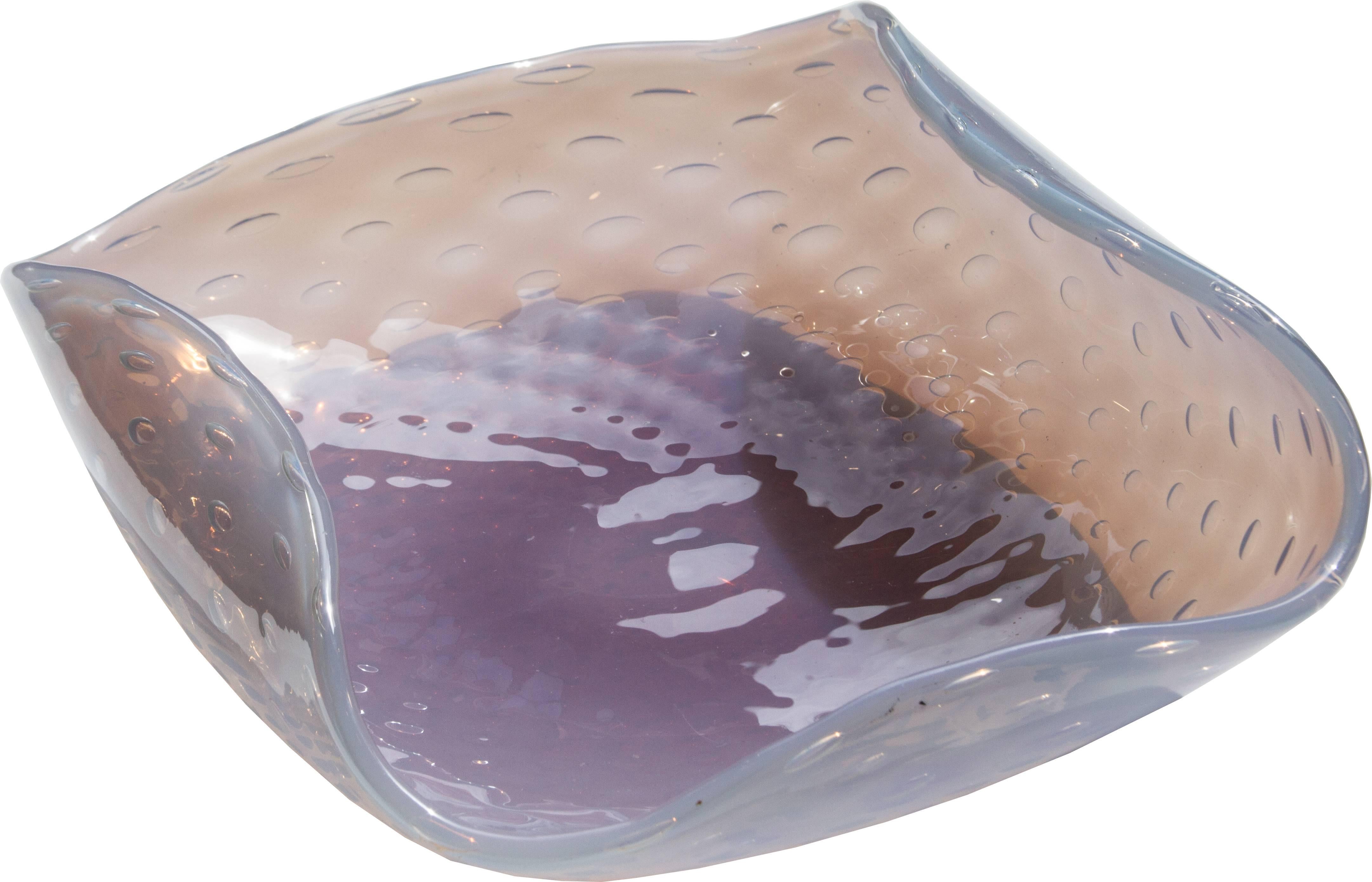 This is a large Murano bowl with a controlled bubble design. The color is unusual, in the light, it looks like a big opal or moonstone casting a pattern.