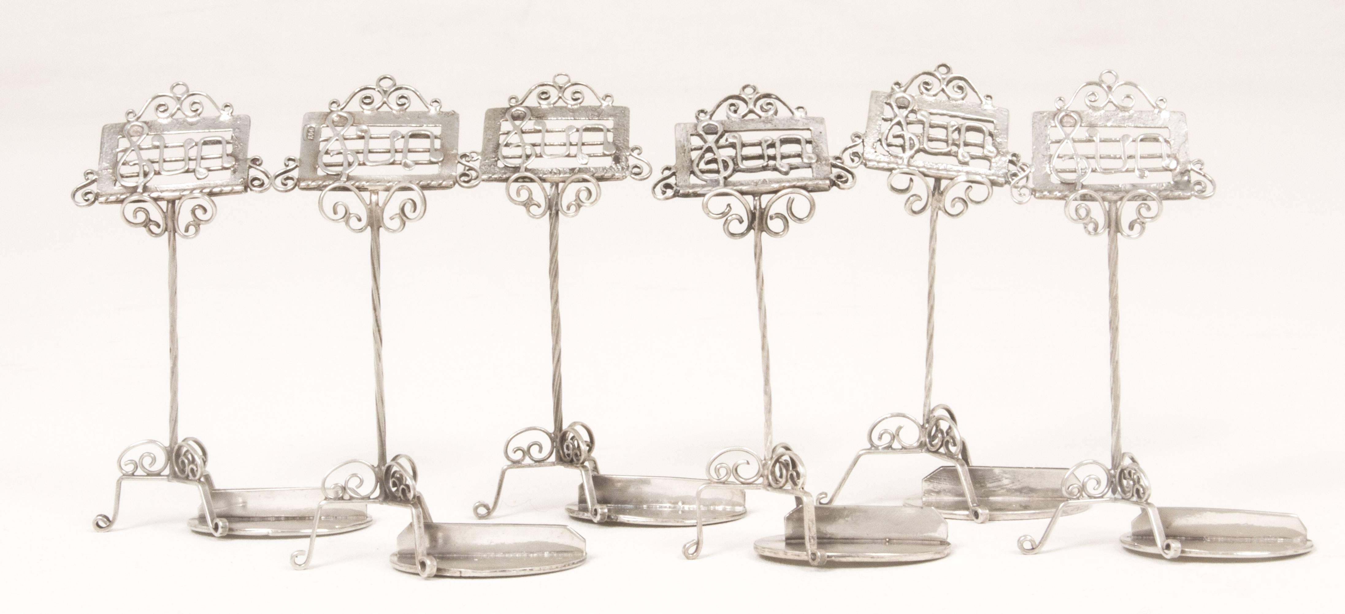 These are whimsical, nicely made music stand place card holders.