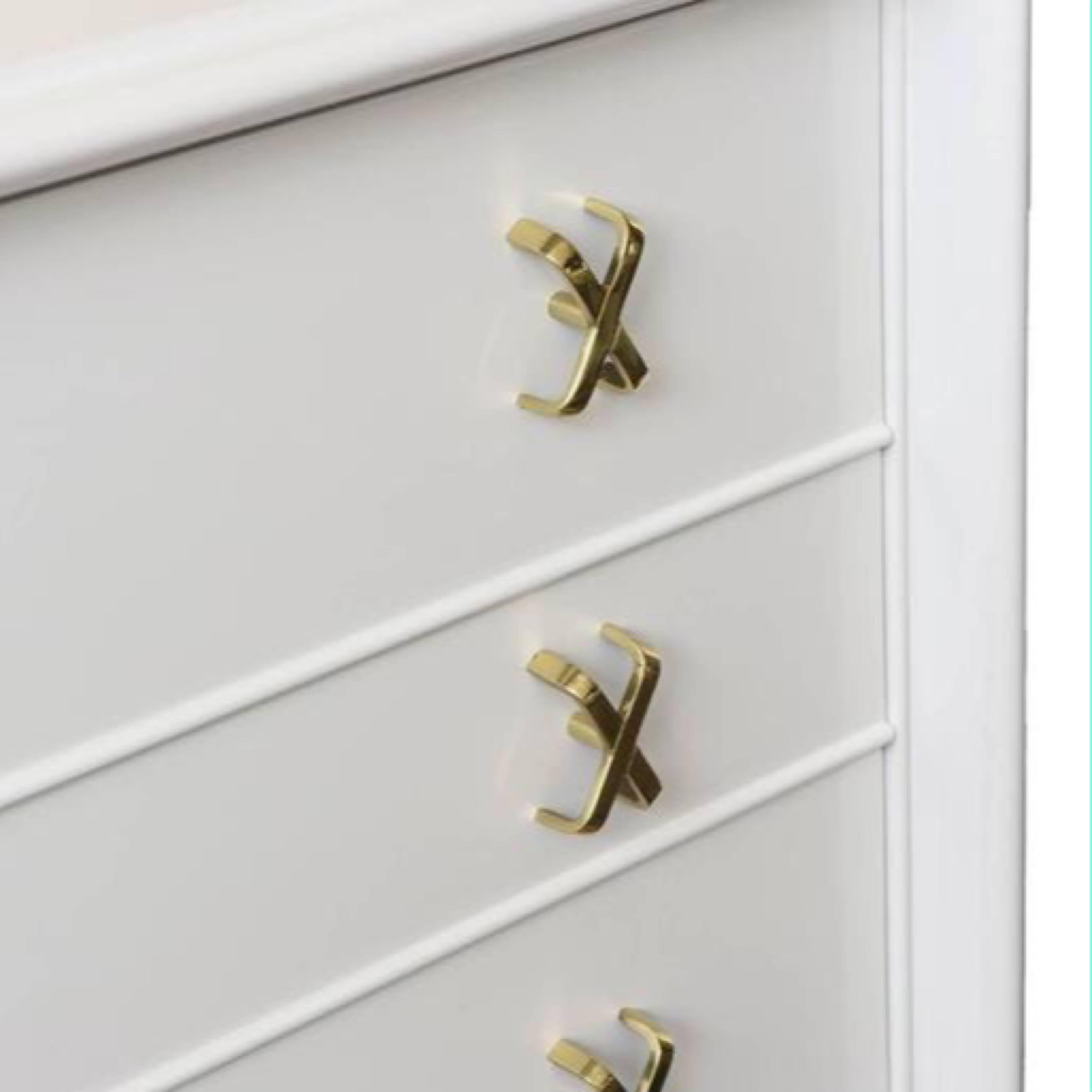 Paul Frankl for Johnson Furniture, Gentleman’s chest or high boy  with brass X pulls, circa 1950s.  Ample storage in a tall chest of drawers. Shown in white lacquer but currently being refinished so can be custom finished in a color of your choice. 
