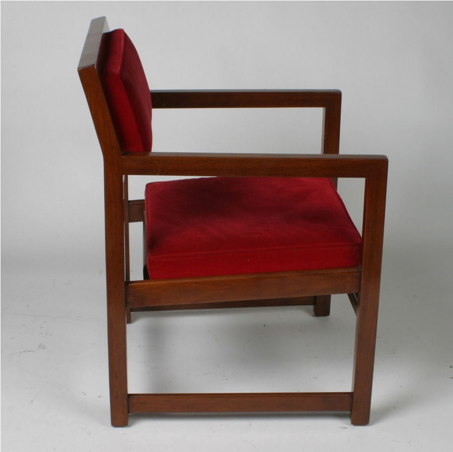 Edward Wormley for Dunbar Model number 842, set of eight armchairs in mahogany with red velvet seats. All original, minor touch up prior to shipping. These chairs were used around a large custom dining table in the school of Frank Lloyd Wright by