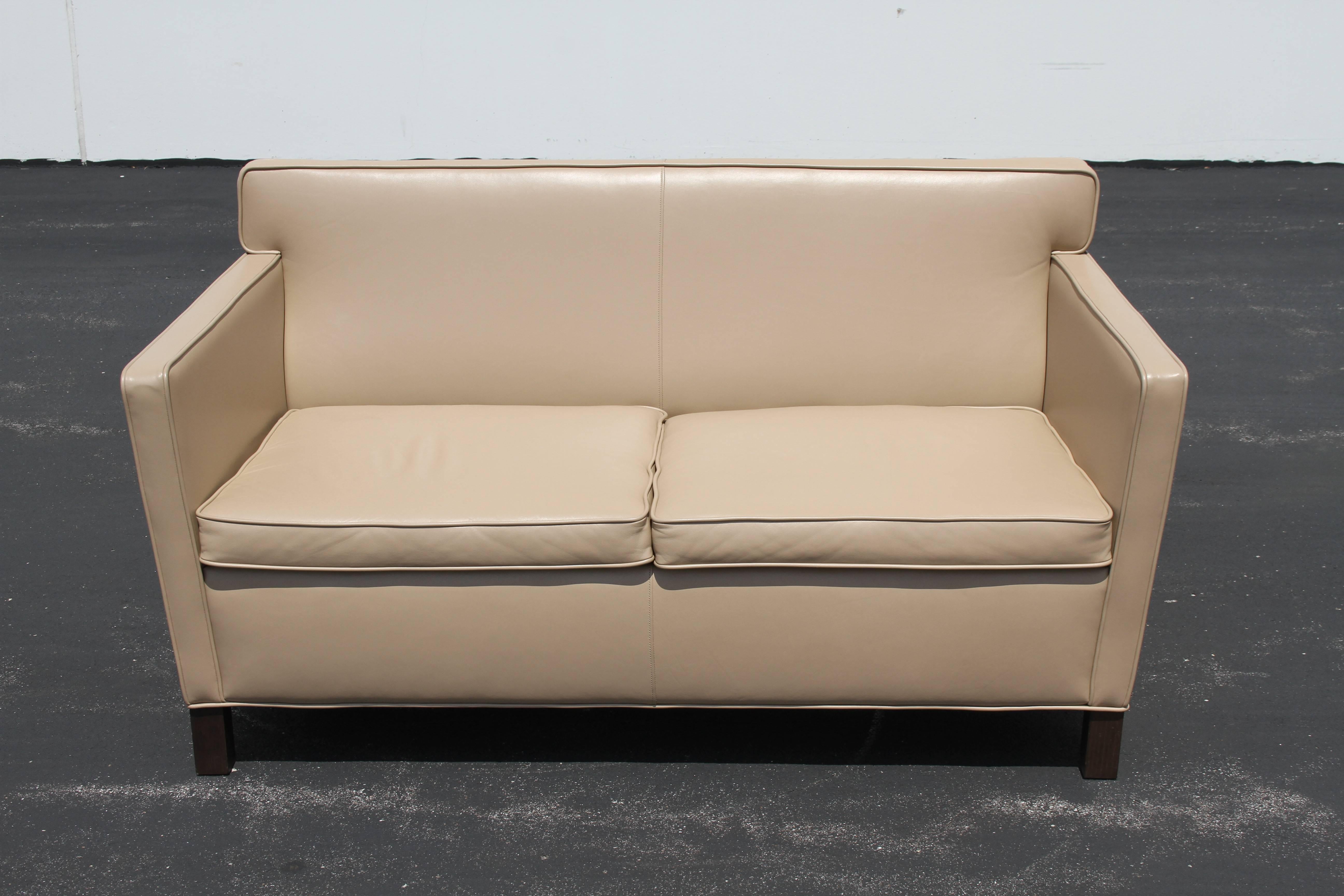 Mies van der Rohe Krefeld Tan leather settee for Knoll. Recent production based on his 1930s designs for the Esters and Lange residences in Krefeld, Germany. Measures: Arm: H 25 and seat is 17