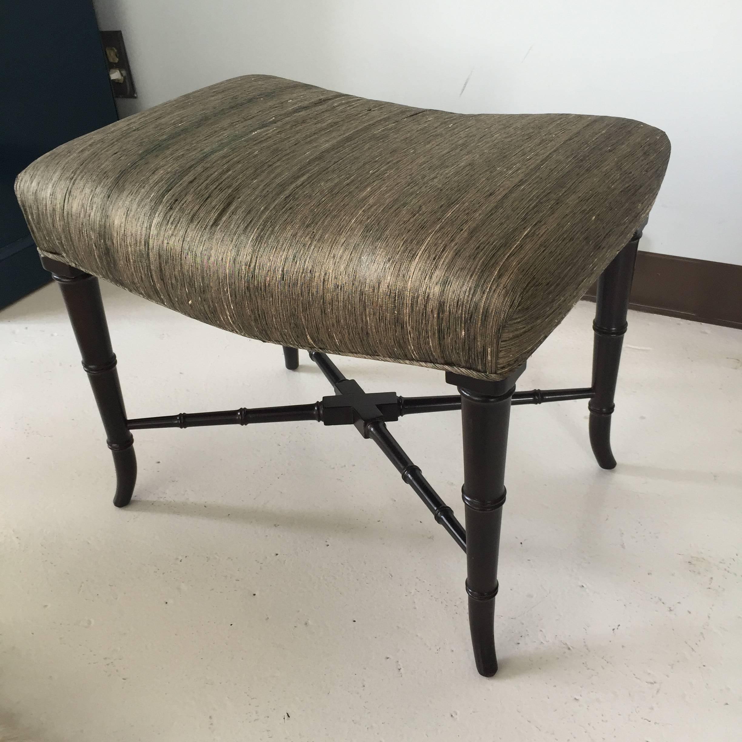 Elegant bench with dark brown mahogany splayed legs carved to resemble bamboo, silk upholstery has some fading 