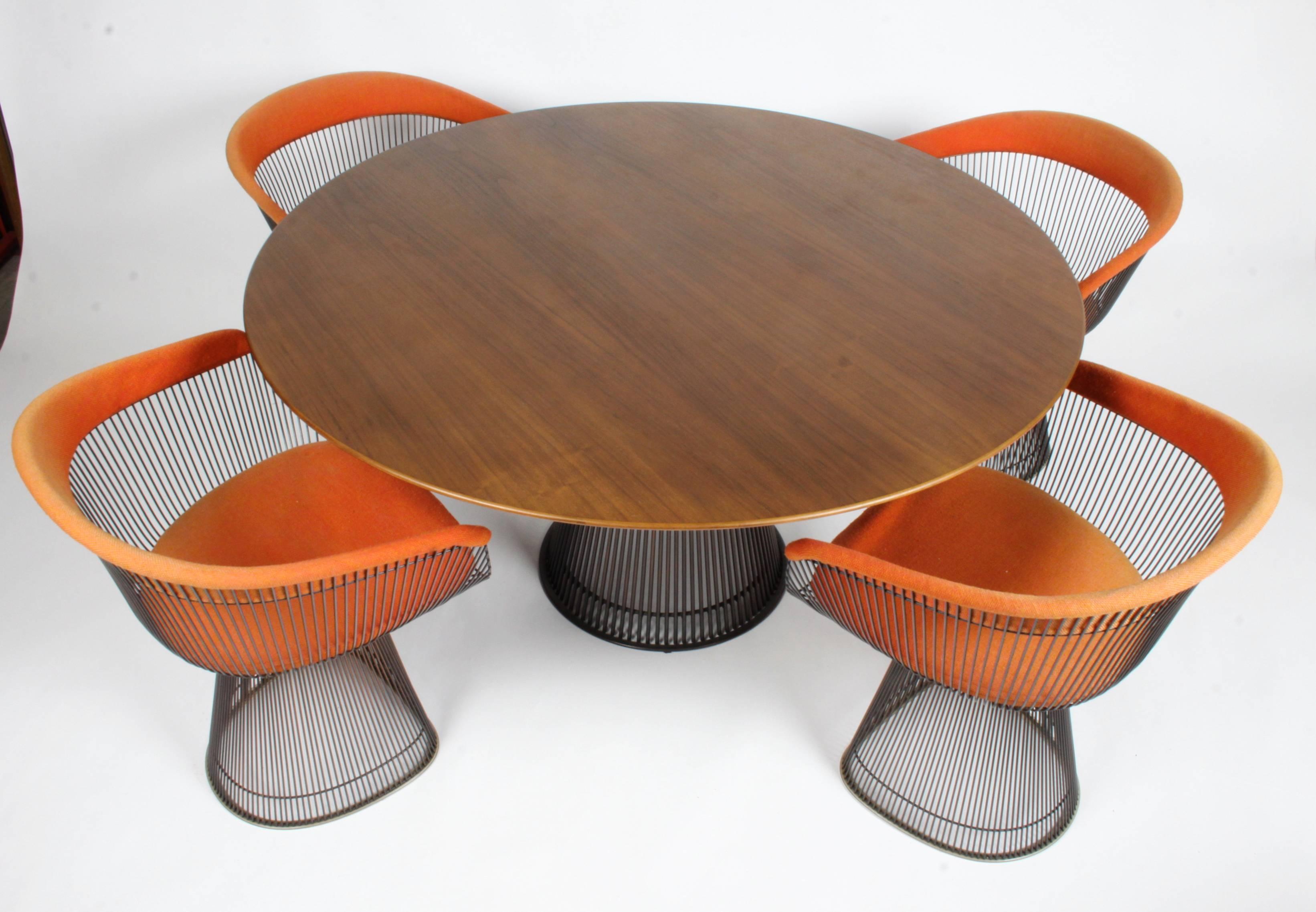 Vintage Warren Platner for Knoll bronze dining set for Knoll with early labels. The top has been refinished, the chairs upholstery and foam are original and may need to be updated, as it shows light sun fading and stiffness to back and arm foam. Two