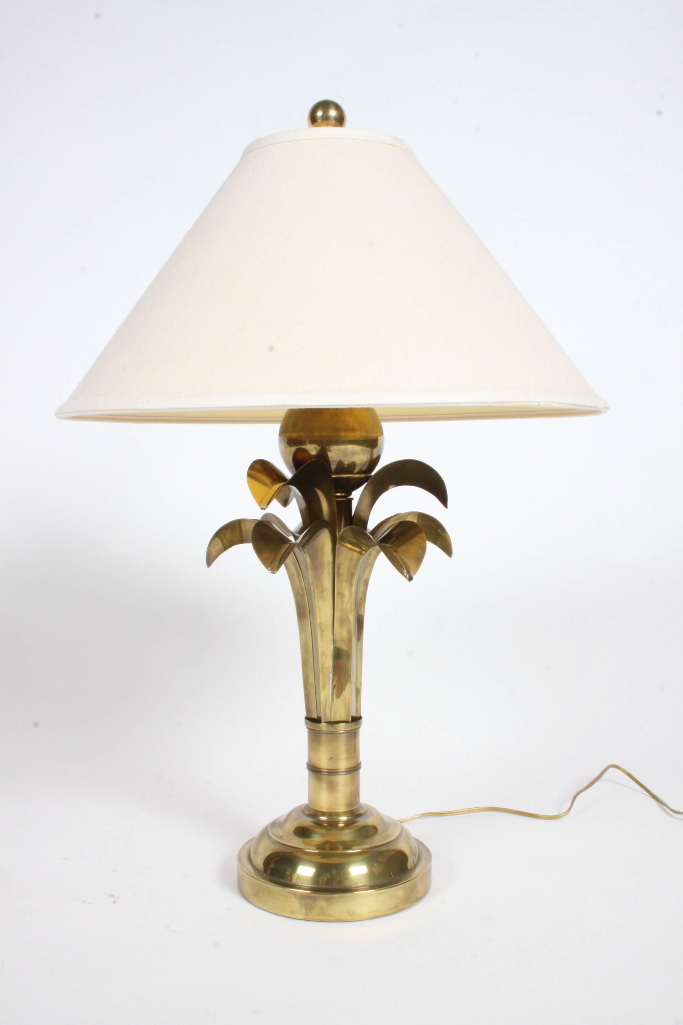 Pair of brass palm leaf tree lamps in the style of Maison Charles, circa 1970s, possible by Hart Associates Lighting. Very well made, solid brass, great warm brass patina. Original shades are 20.25