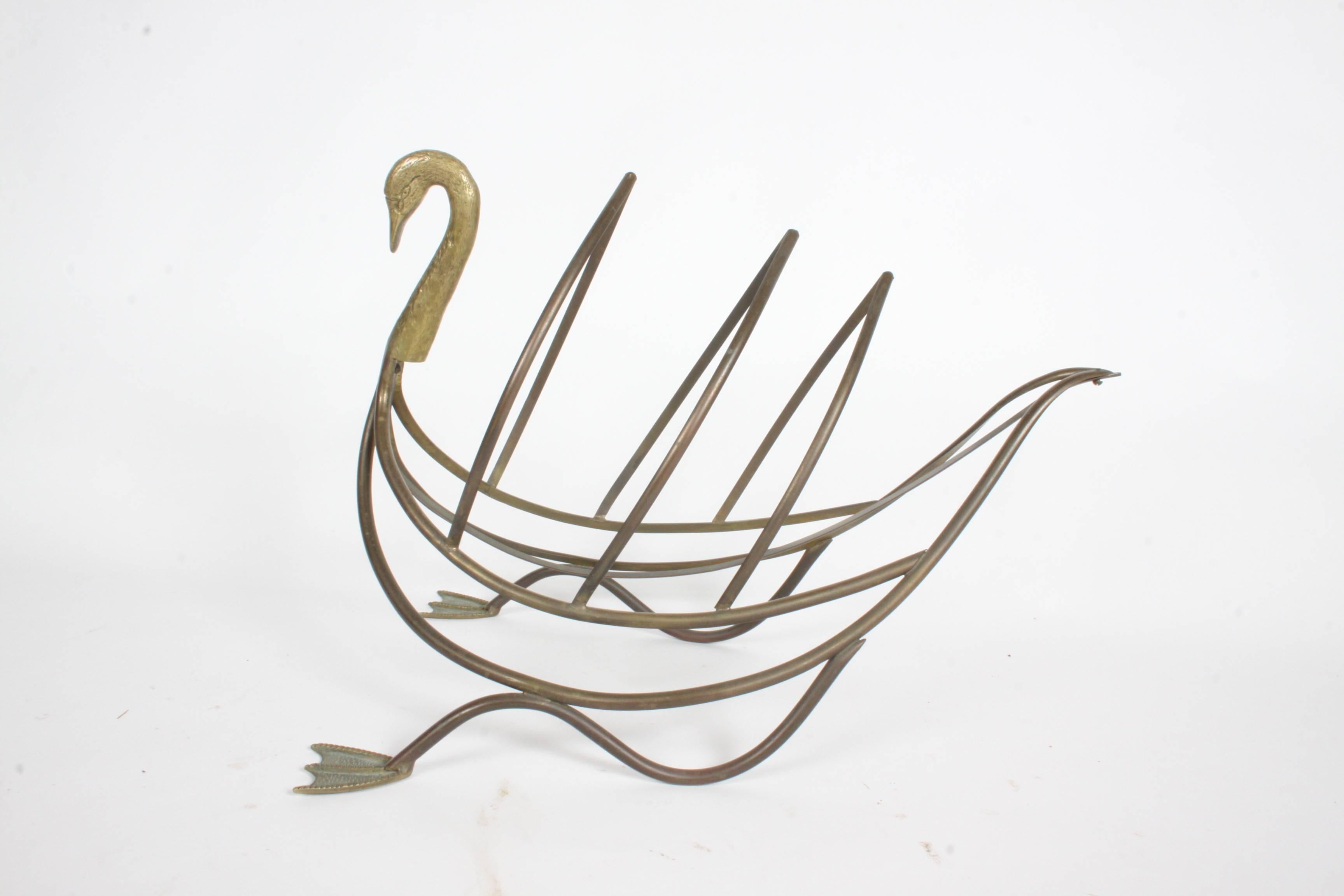 Vintage Maison Jansen style brass swan magazine rack or book holder, stamped Made in Italy.