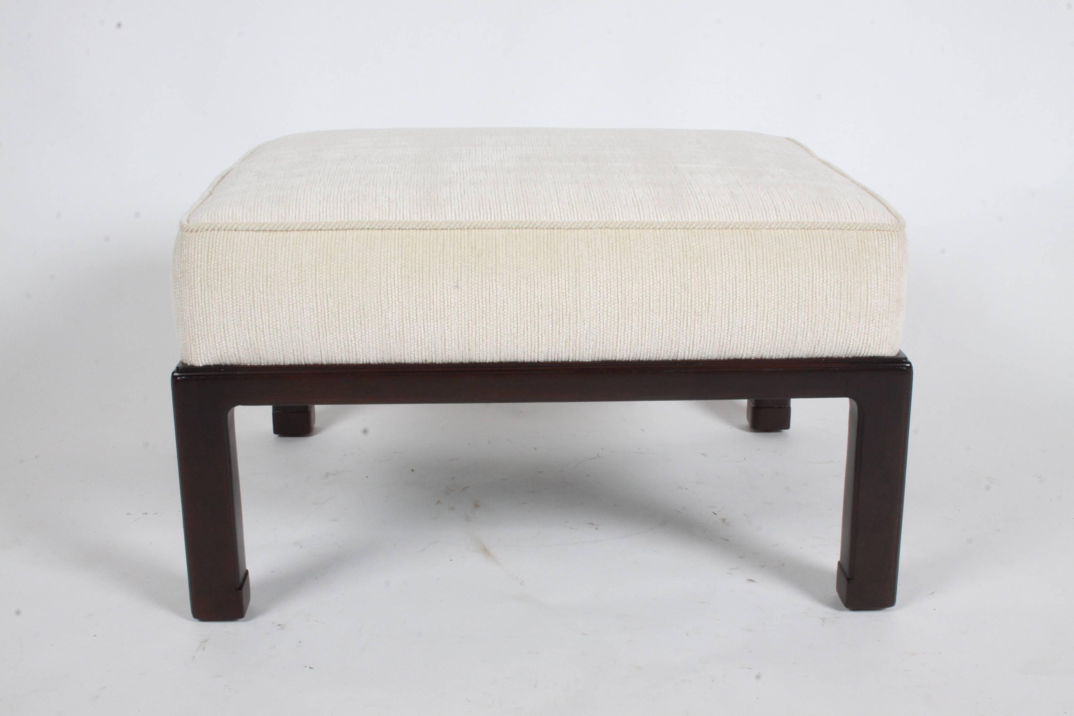 Edward Wormley for Dunbar Ottoman, circa 1950s. Newly refinished mahogany base in a dark espresso finish. Reupholstered and new foam. Nice Asian details to legs.