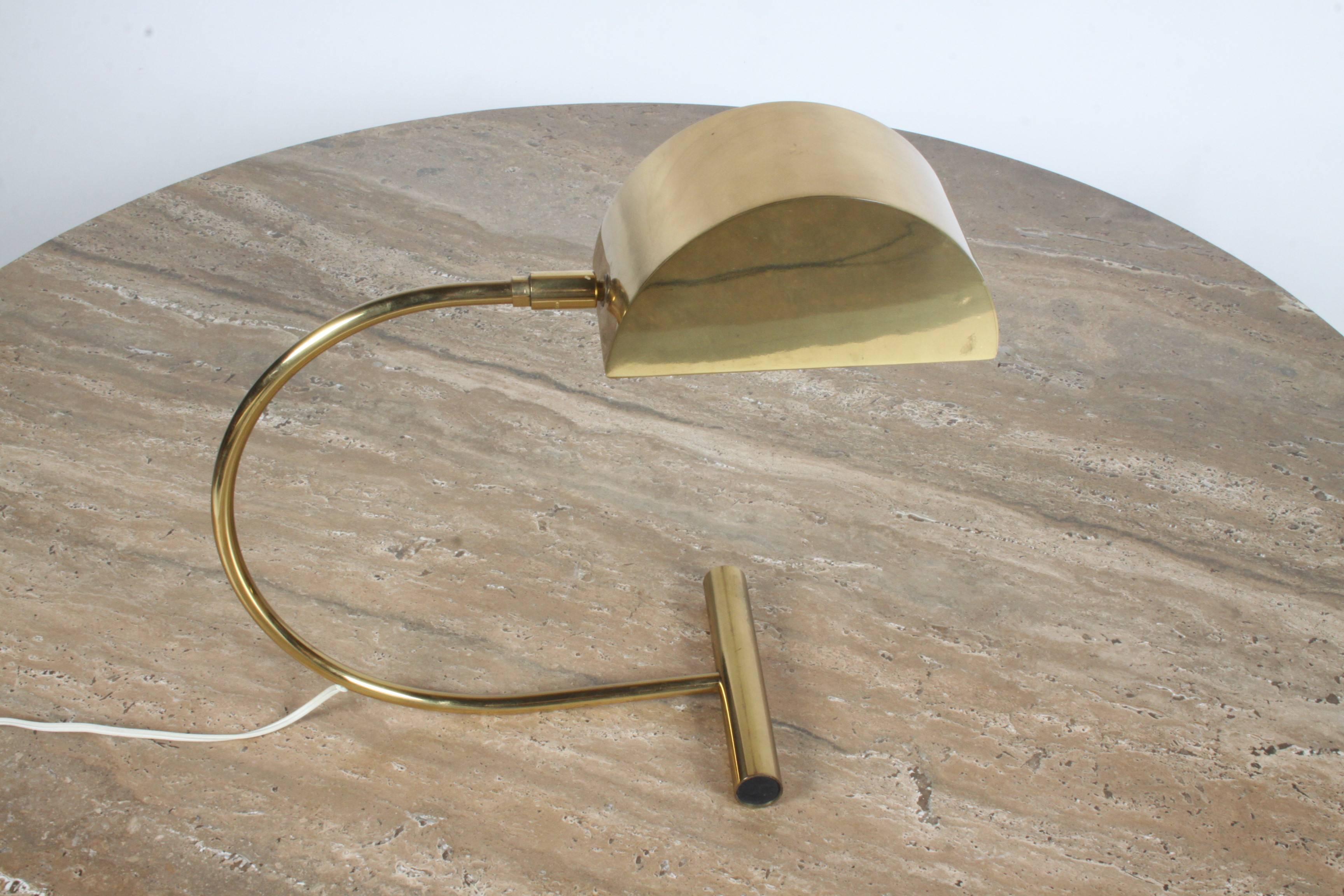 Koch and Lowy brass articulated desk lamp. In fine working condition, minor scuffs to brass.