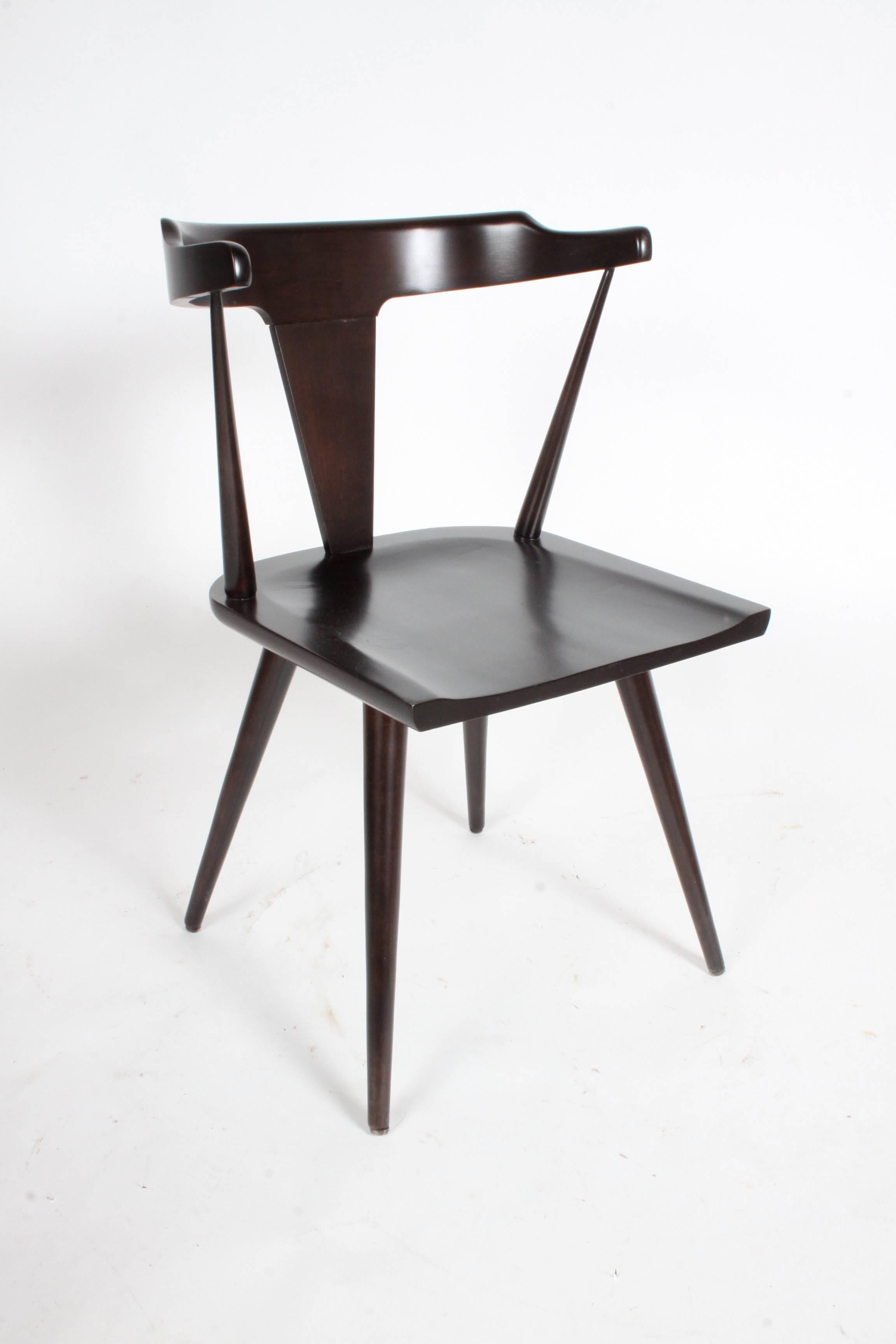 Set of four Paul McCobb Planner Group dining chairs model #1530, refinished in a dark espresso. No labels.