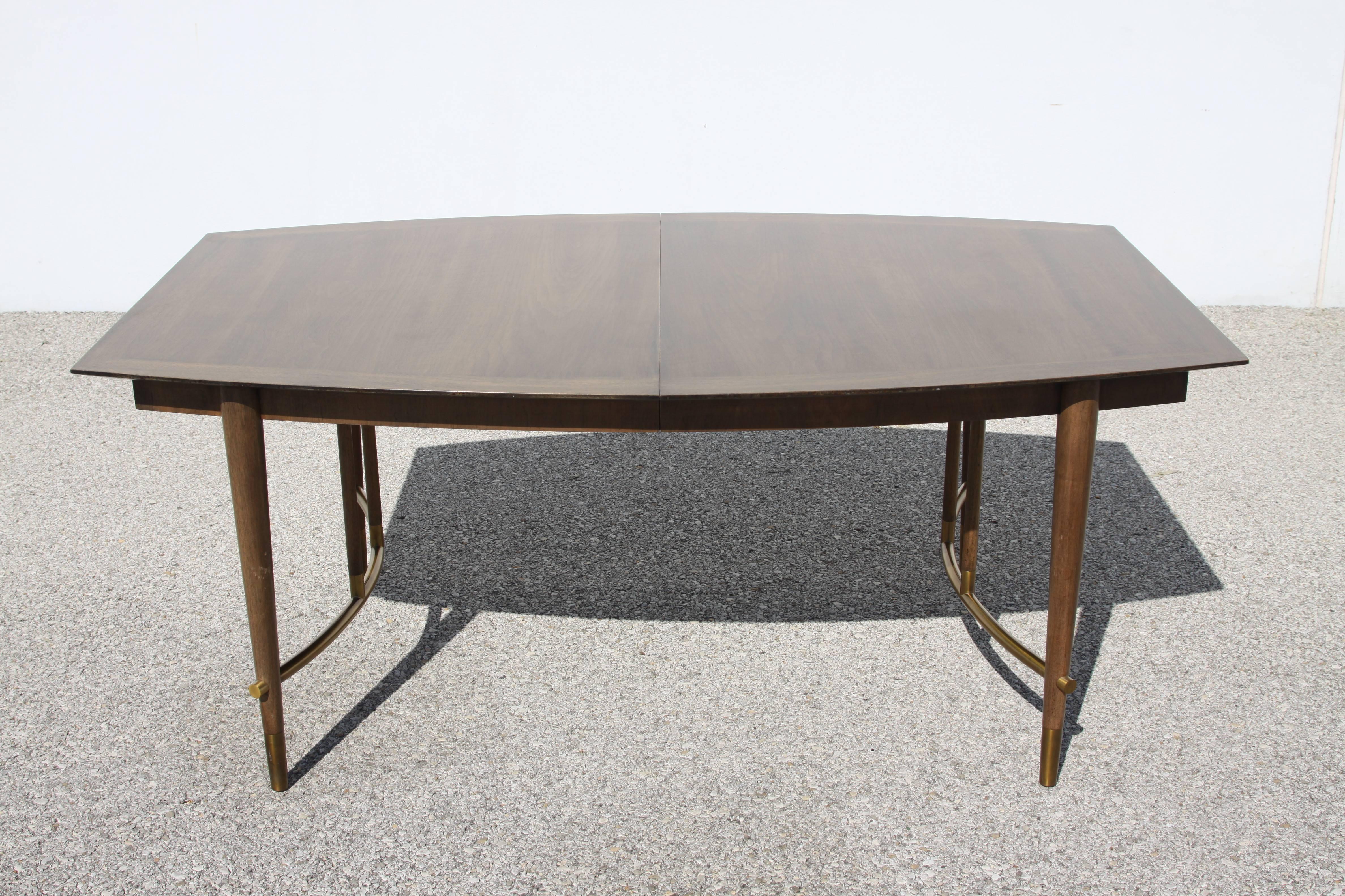 Bert England for Johnson Furniture Dining Table, Forward Trend Label. Walnut with brass details. Table to be refinished, included in price , has one 11