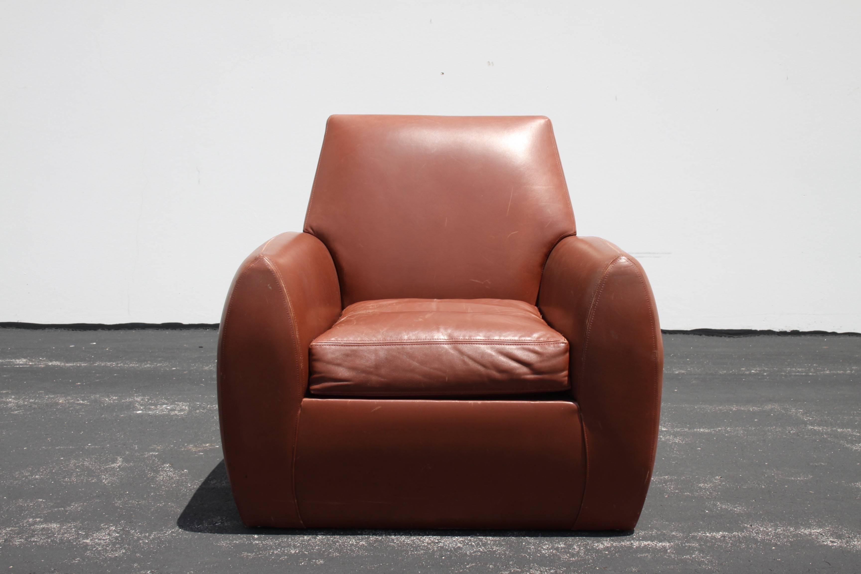 Dakota Jackson Ke-Zu leather club or lounge chair. Leather shows wear or distress, which give is a nice vintage feel, like the vintage French Deco club chairs it resembles. One chair shown, other has similar wear. Very comfortable club chair.