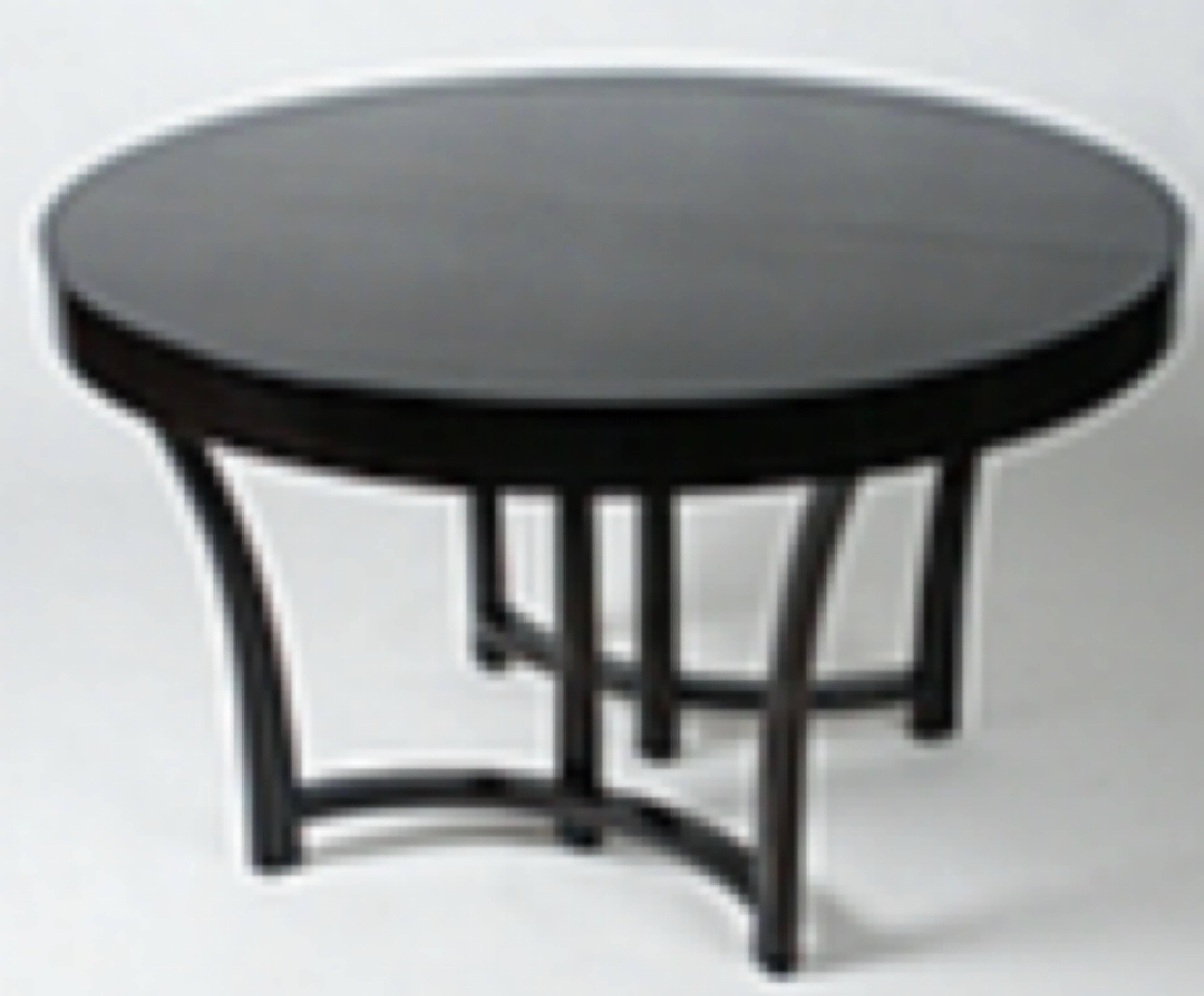 Round dining table by Widdicomb with starburst veneered top, two extension leafs of 18