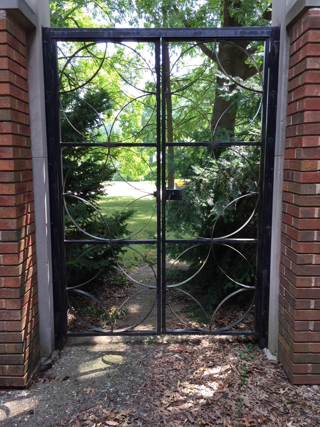 Custom garden gate designed by architect R.L. Fischer & Associates for the St. Matthews Episcopal Church in Warson Woods a suburb of St. Louis, circa 1959. Unfortunately this midcentury gem was recently demolished. This is a well made heavy duty