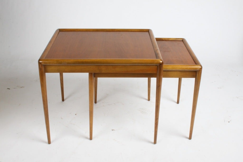 Nesting tables by Robsjohn-Gibbings for Widdicomb, two tables of walnut, currently being refinished.

Measure: Larger table 24