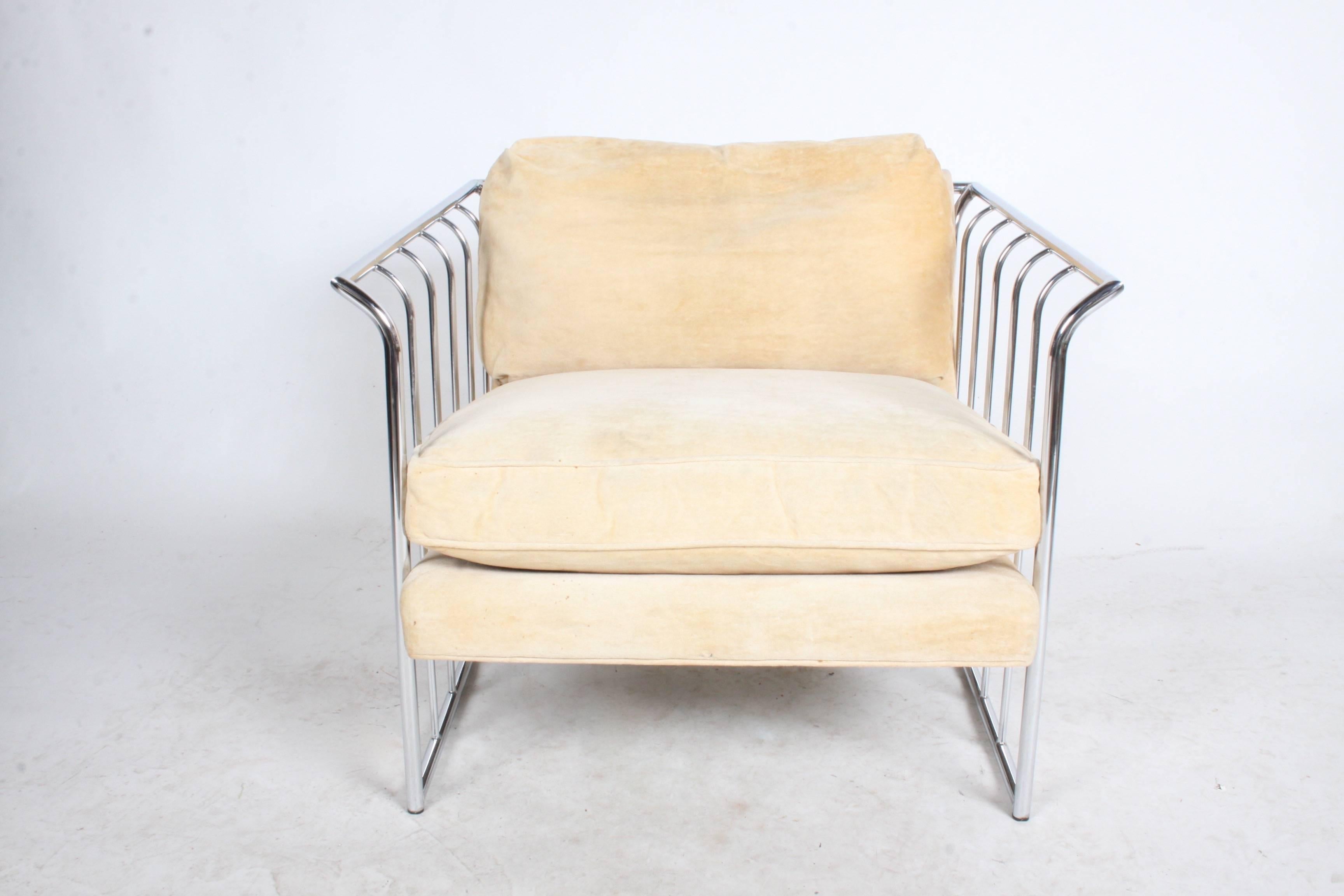 In the style Milo Baughman pair of Lounge chairs with chrome rails. Not sure if this is by Thayer Coggin, Pace or DIA, but they are very well made. In need of reupholstery, foam is Fine and chrome is nice condition, only minor patina. These came