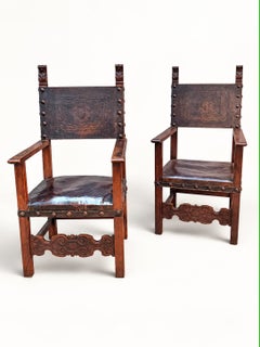 Pair of Baroque walnut arm chairs