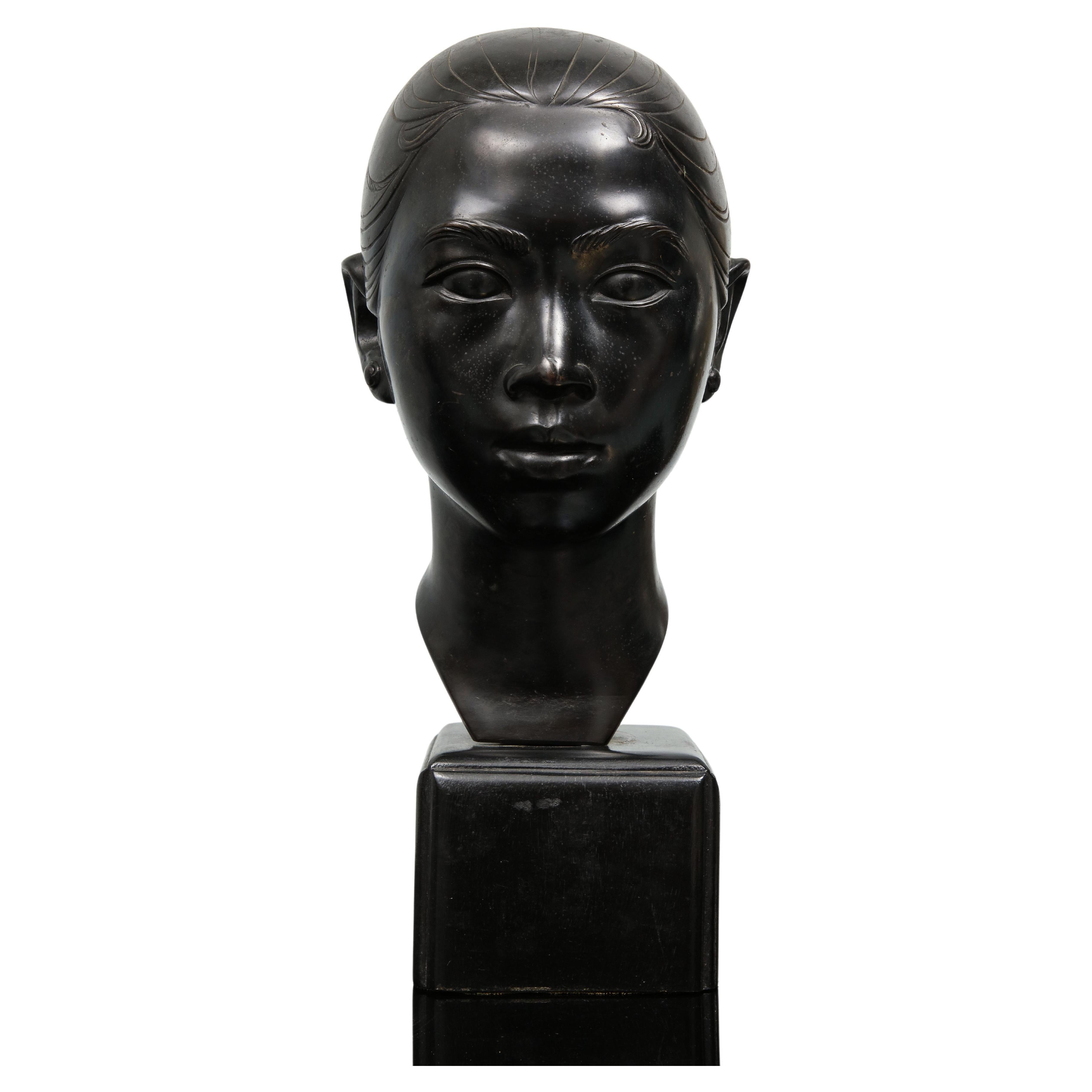 Le Van Mau (1917-2003) was a Vietnamese sculptor. This is a black patinated bronze on its original wooden cube base. It is signed on the back of the neck in Chinese characters. It is from the 40's. 