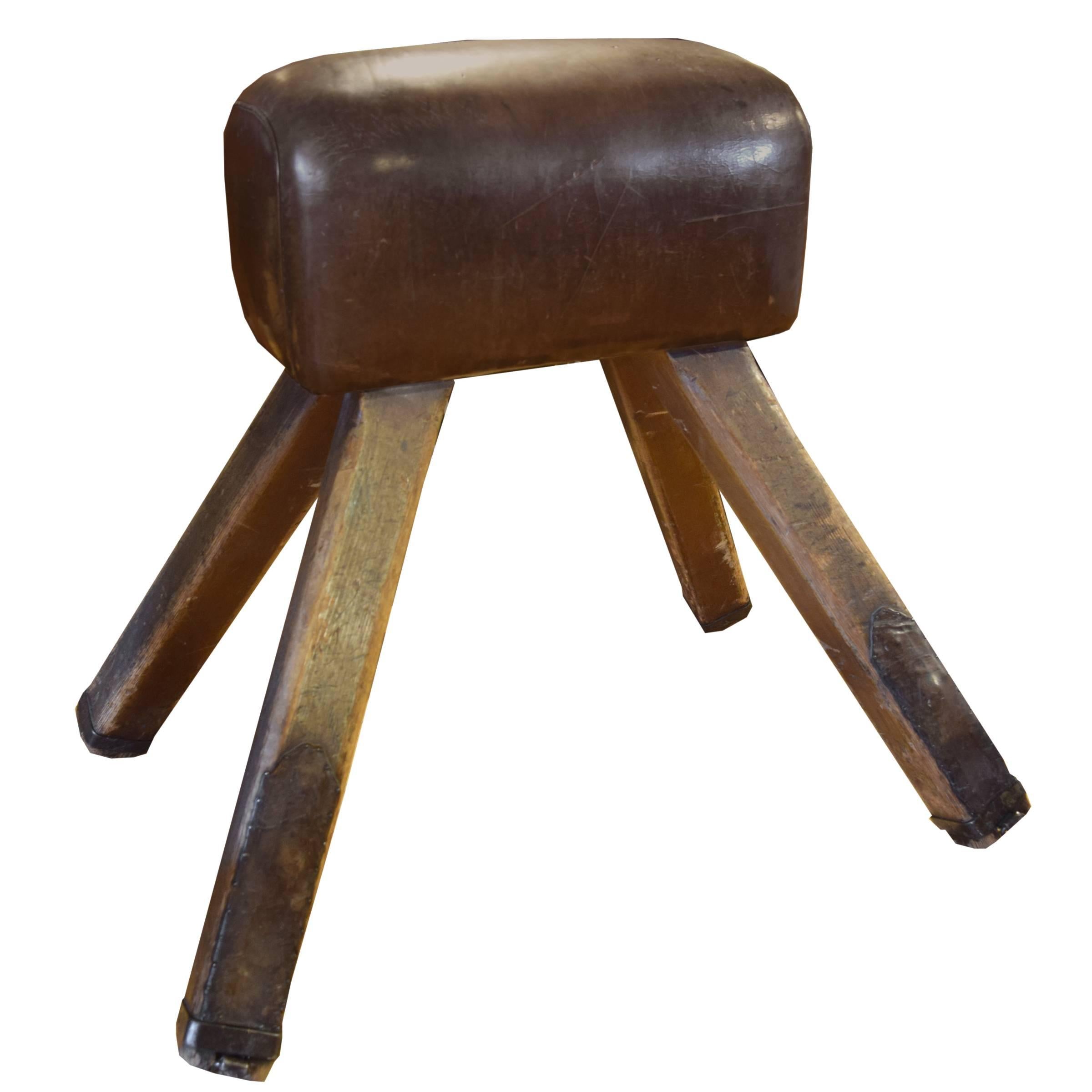 A fantastic early 20th century tall leather pommel horse with leather clad wooden legs, from a gymnasium in the Czech Republic.