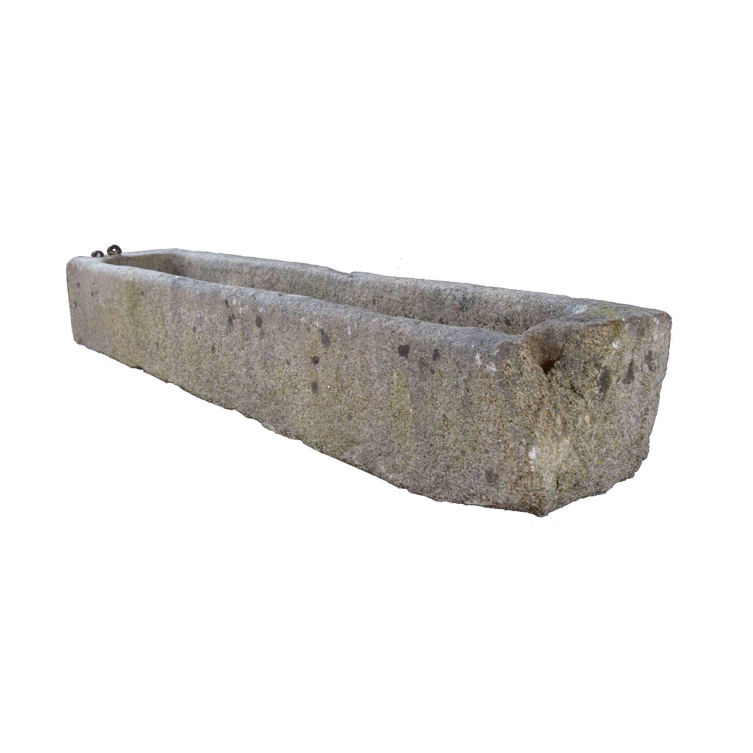 A rectangular granite trough from the Czech Republic with a gorgeous patina and interior drainage holes, circa 1800.

 