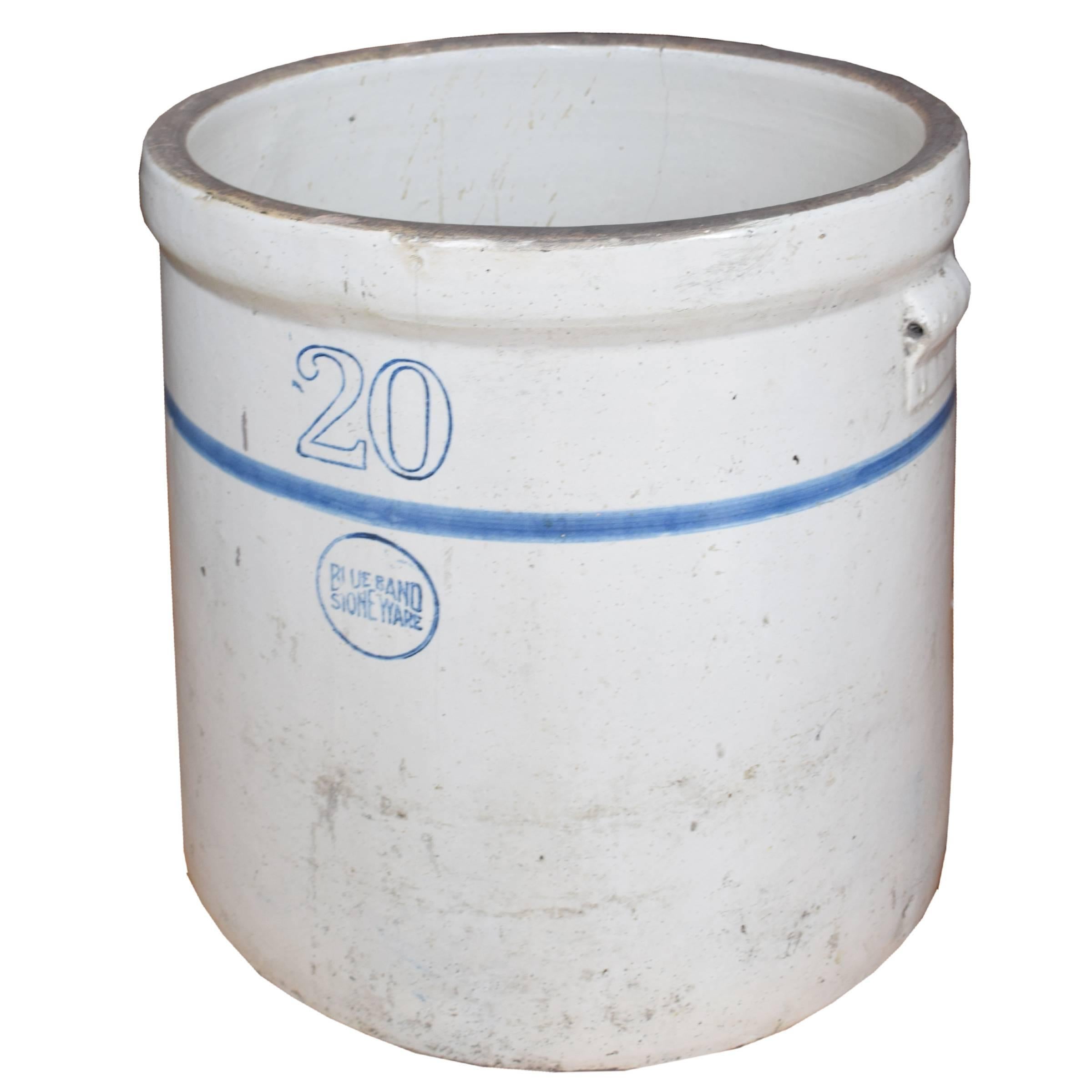 An American blue band stoneware glazed crock with a 20 gallon capacity. Marked with a large '20', a crisp blue band and the blue band stoneware logo, circa 1900.
                          