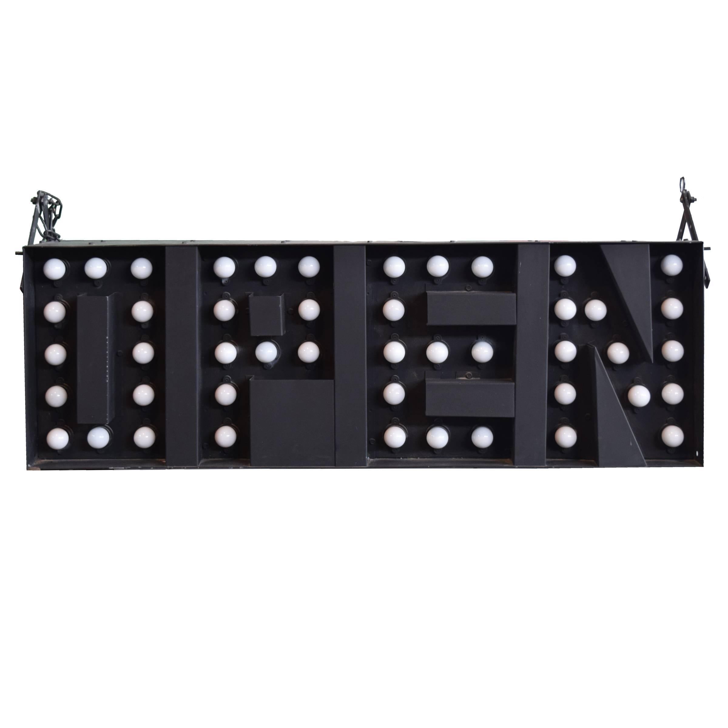 An American double-sided electrified “OPEN” sign with opaque white bulbs and hanging chain. Works great!
 