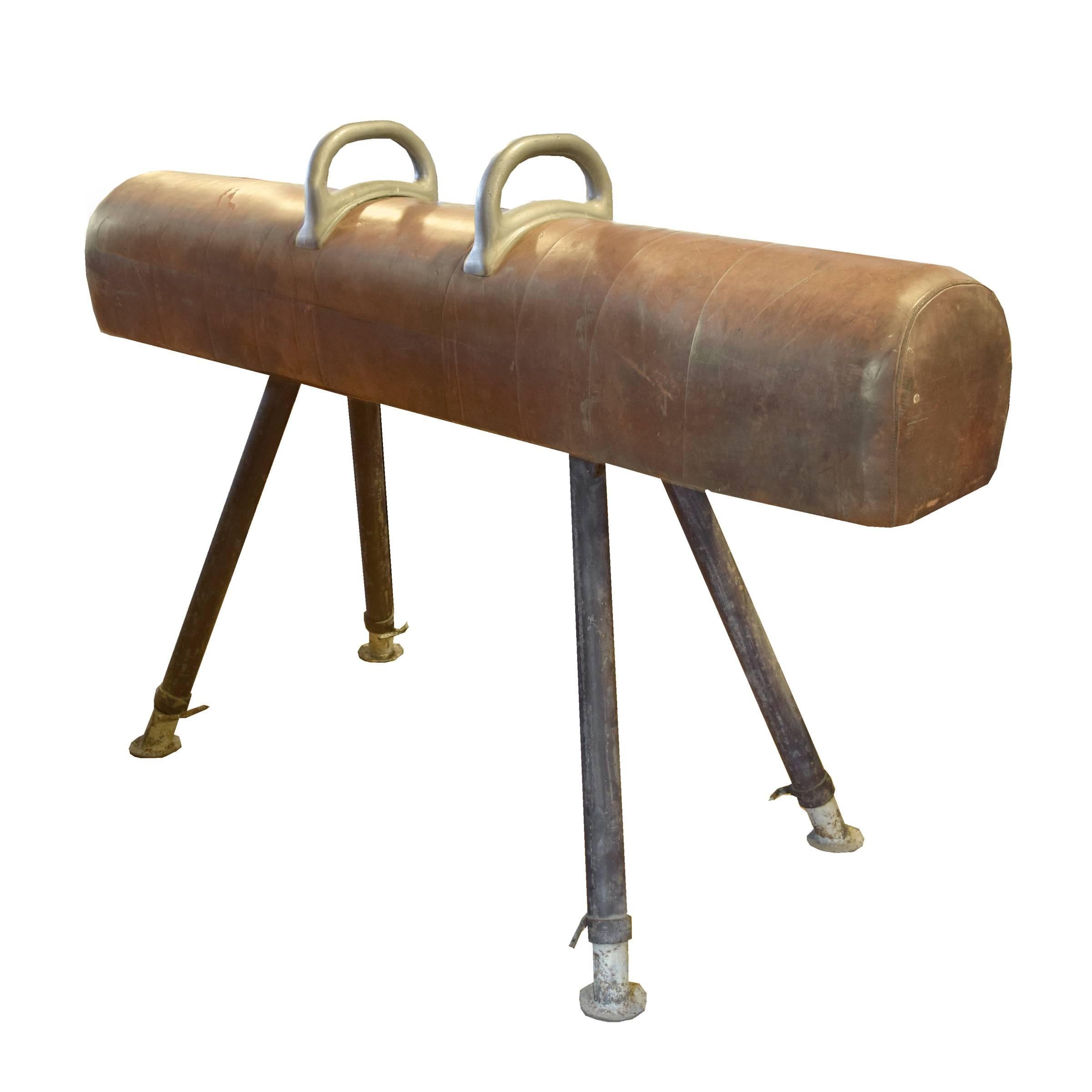 A sporty early 20th century leather, wood and iron pommel horse with adjustable legs and two handles, from a gymnasium in the Czech Republic.