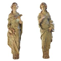 Pair of American Composition Statues