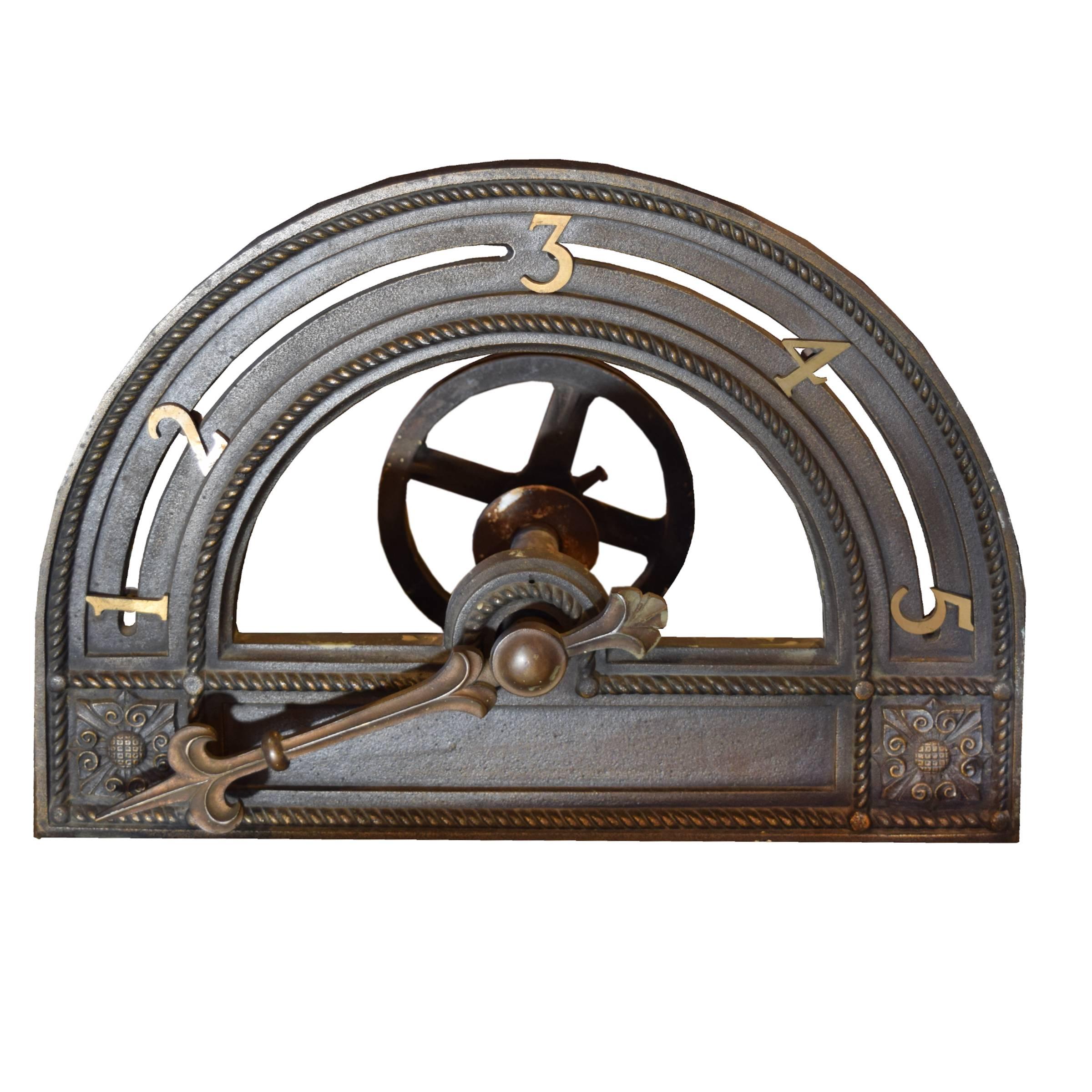 A lovely American finely cast bronze elevator indicator denoting five floors with fleur-de-lis tipped arm and rosettes in each corner, circa 1910.
   