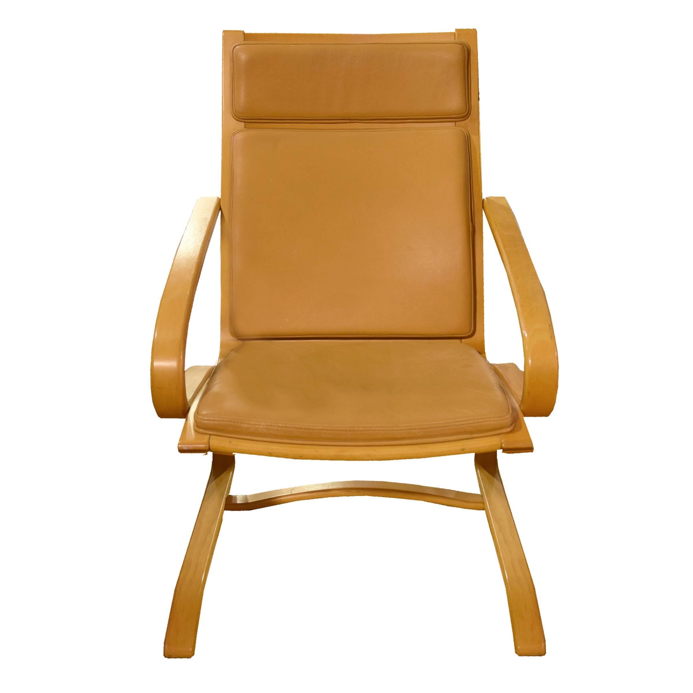 A pair of Italian Mid-Century chairs with bentwood frames and upholstered seats and backs.