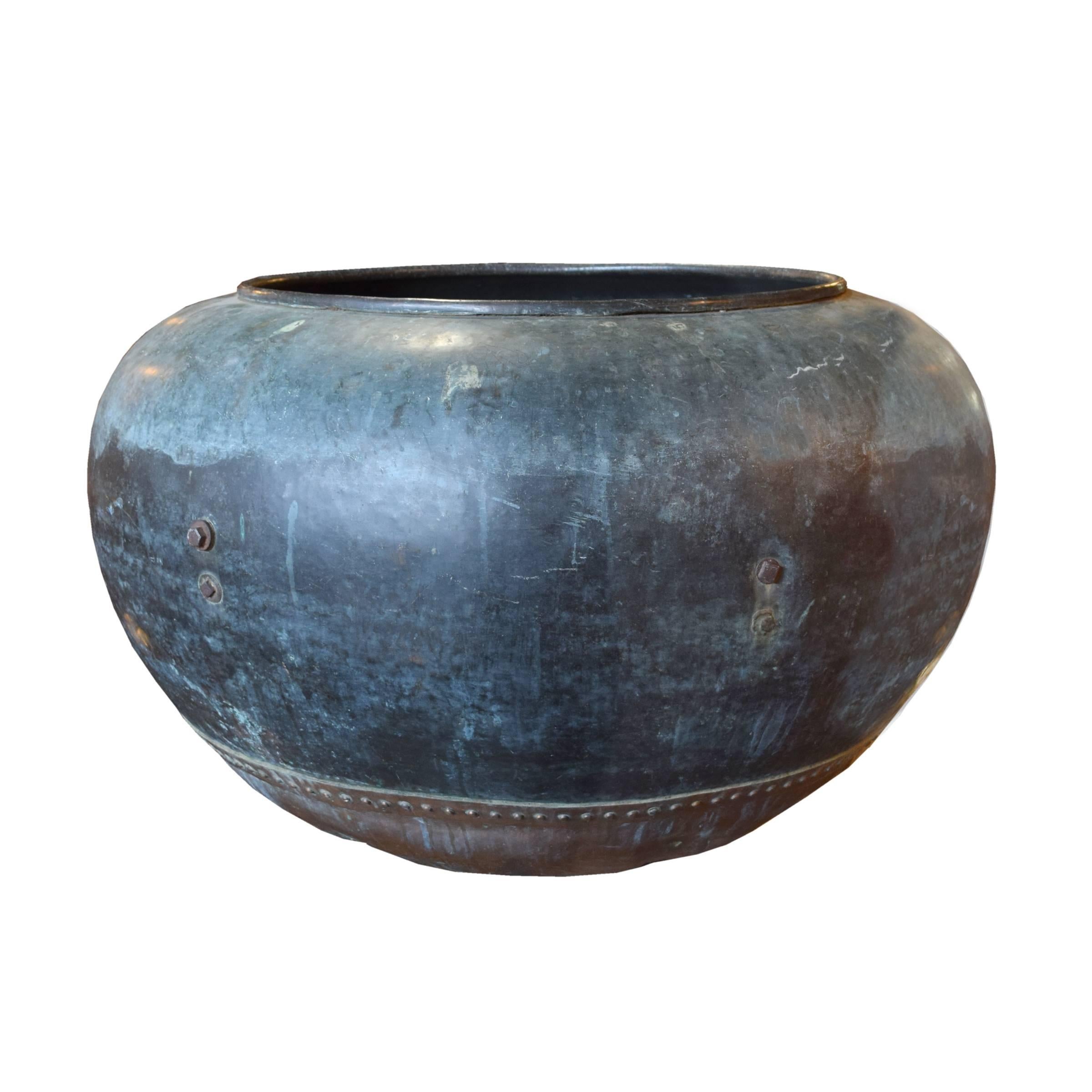 The best French oversize copper vessel with a riveted double bottom and incredible patina.