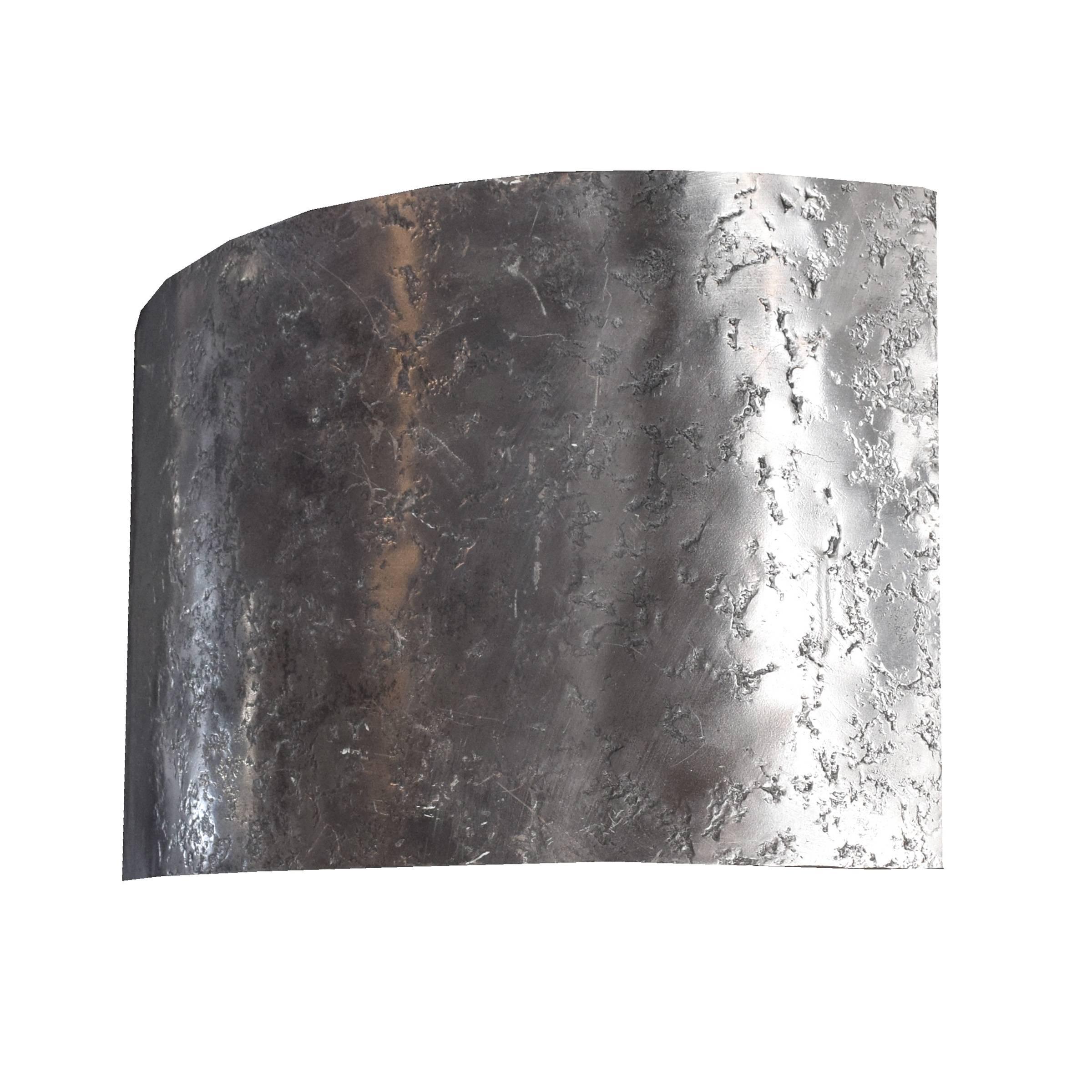 A French convex hammered flush mount wall sconce.