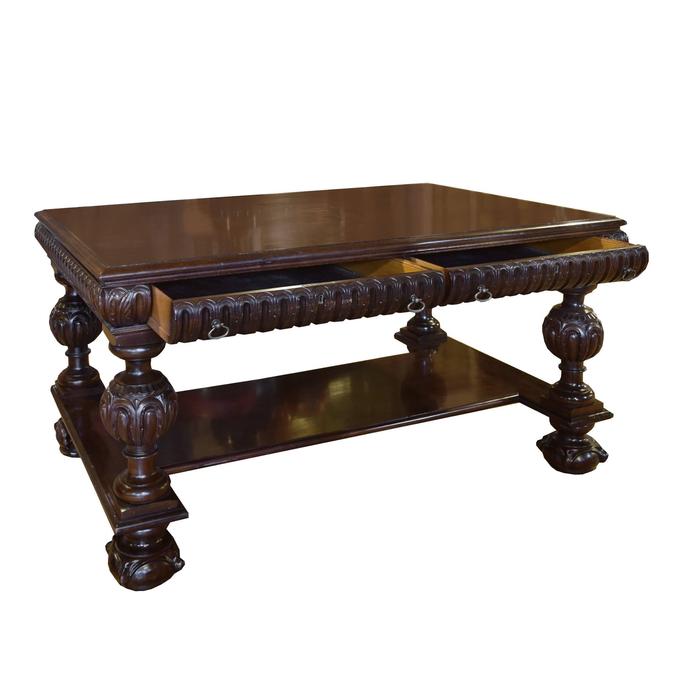 An American mahogany two-drawer desk with wonderfully carved legs, circa 1920.