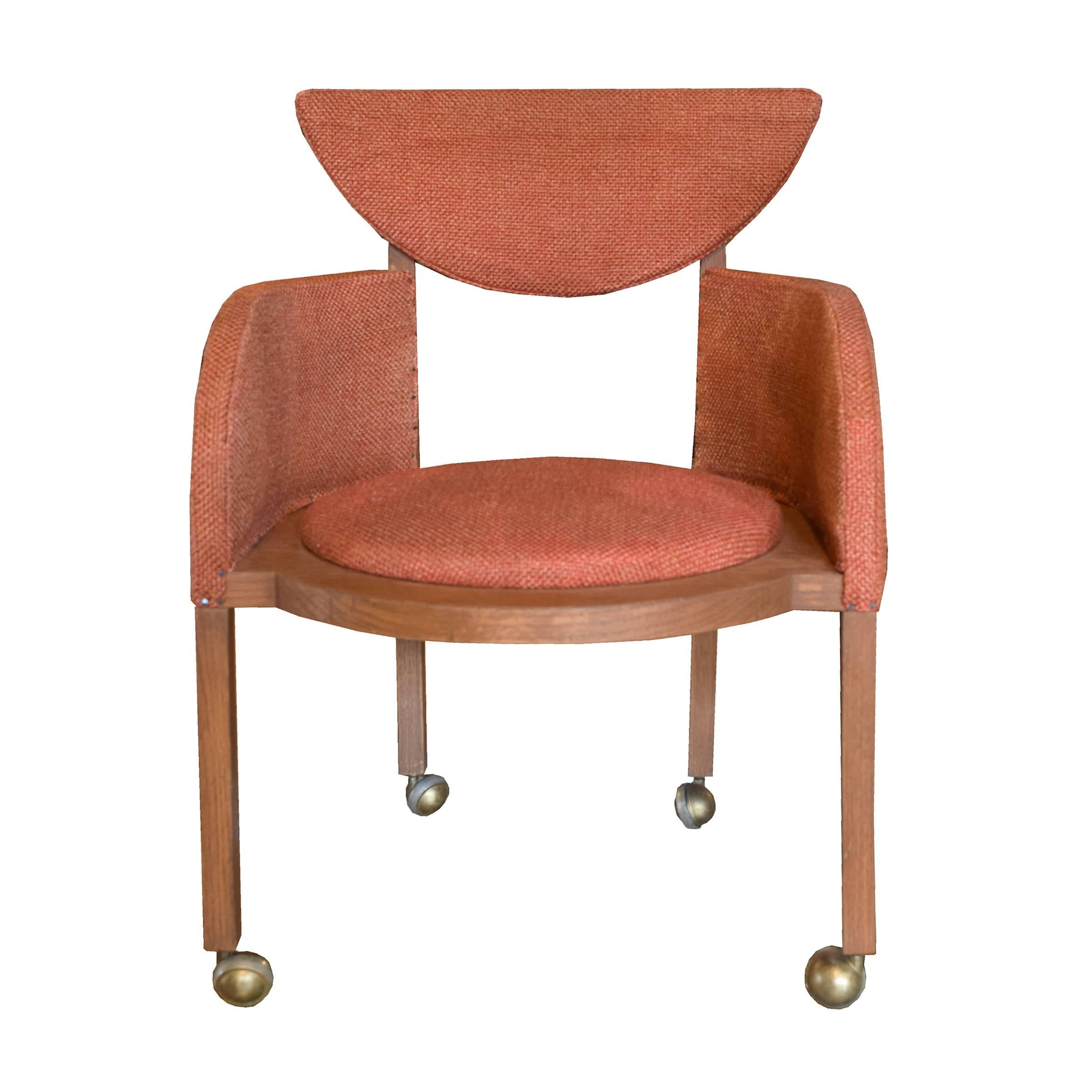 A pair of Frank Lloyd Wright designed armchairs with original upholstery and casters from the Riverview View Terrace Restaurant in Spring Green, WI. The restaurant, built in 1953, is across the street from Wright's Wisconsin home and studio,