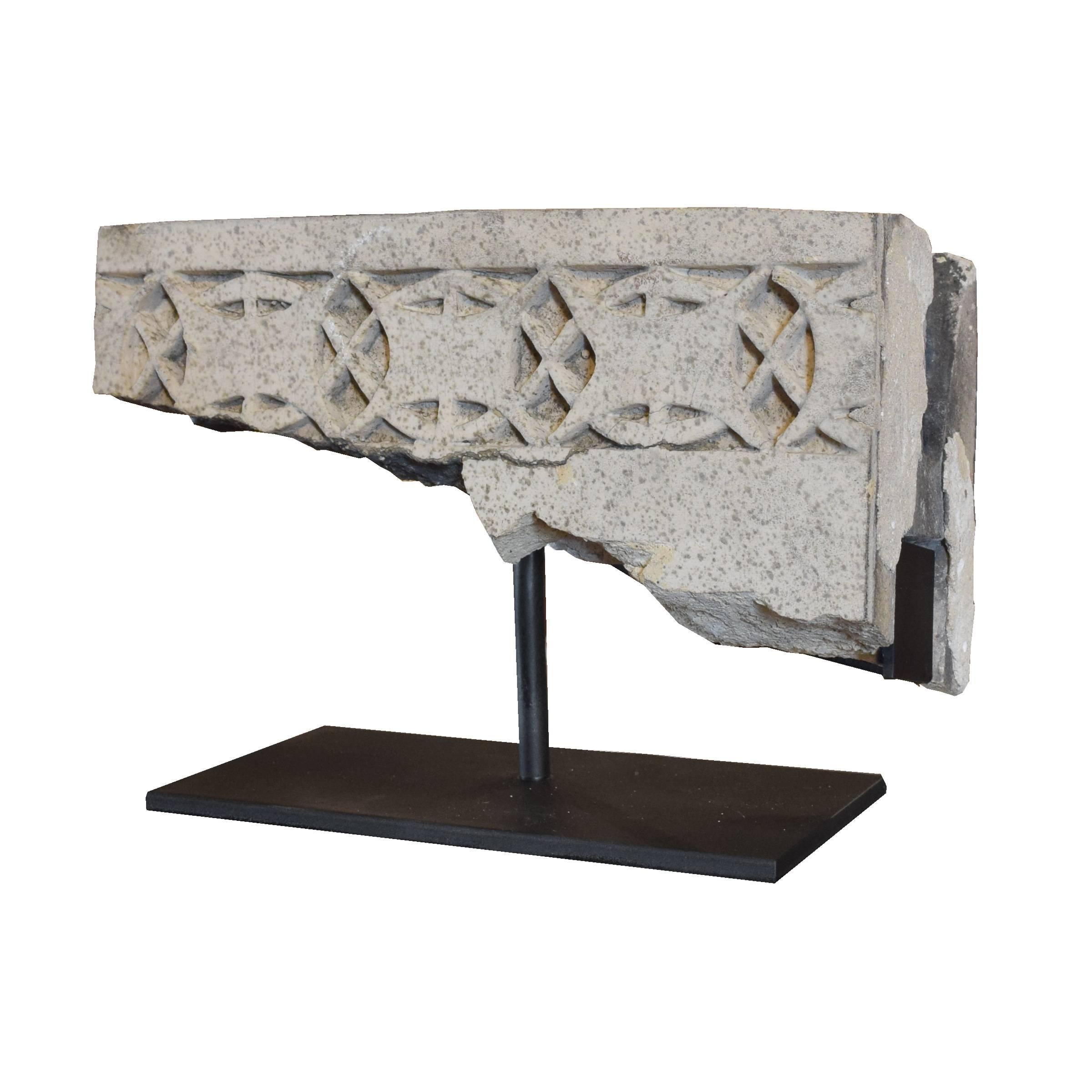 A fantastic fragment from the Gage building, 1898, designed by the legendary firm of Adler and Sullivan. This rare fragment was removed from the building, which still stands, during previous repairs. On custom mount.