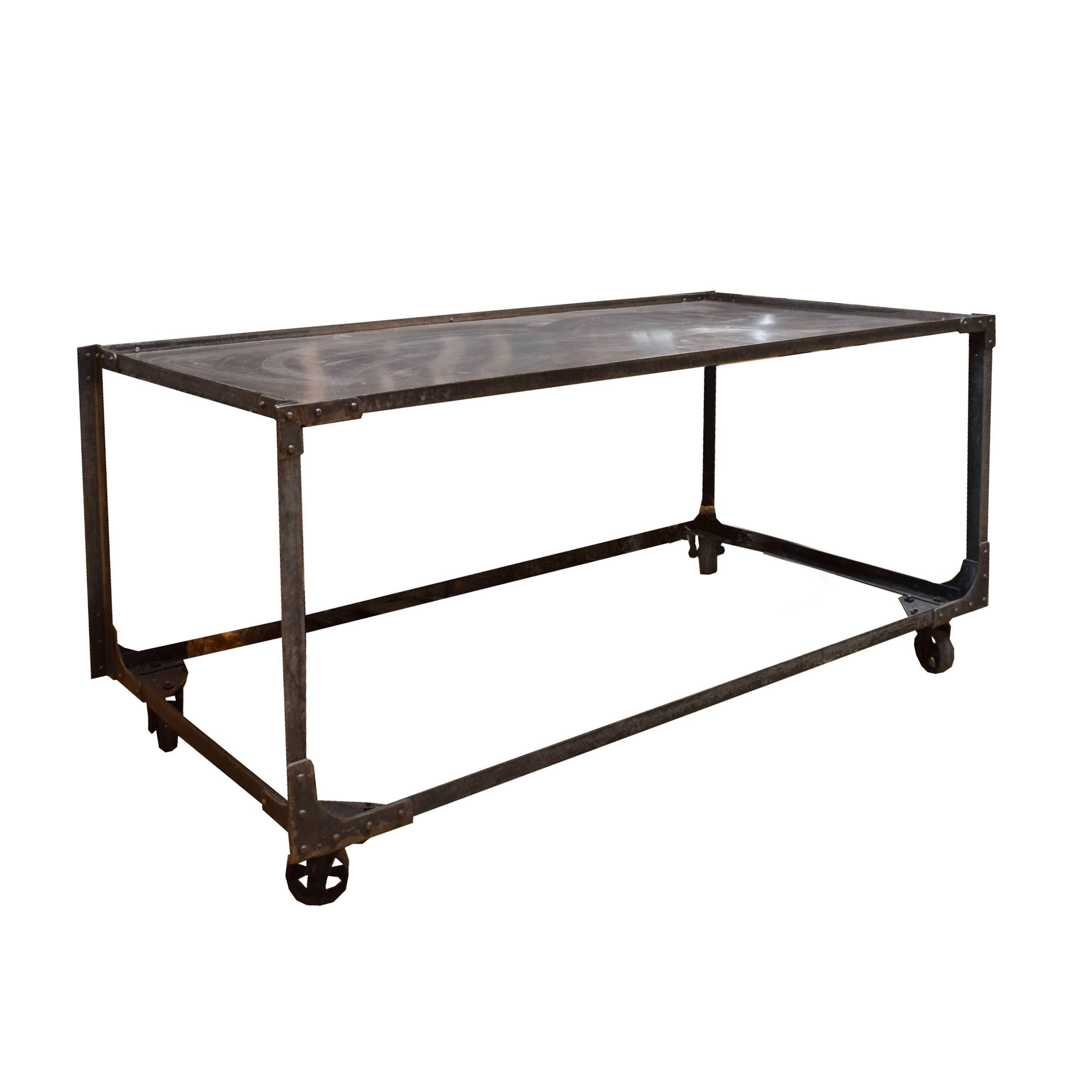A large American Industrial metal table on castors, circa 1920.
Add a butcher block top and it's perfect for a kitchen.