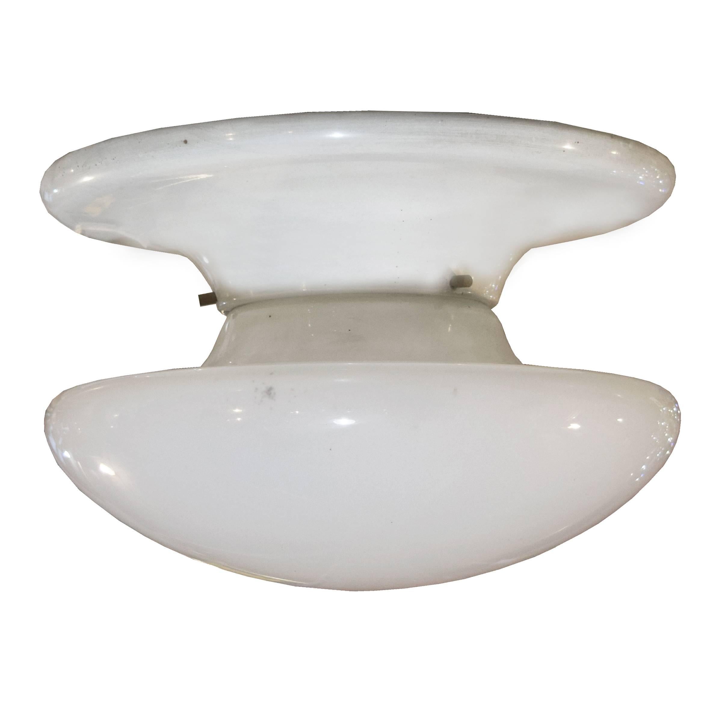A charming Italian midcentury flush mount light fixture with an opaque glass shade. Many available.