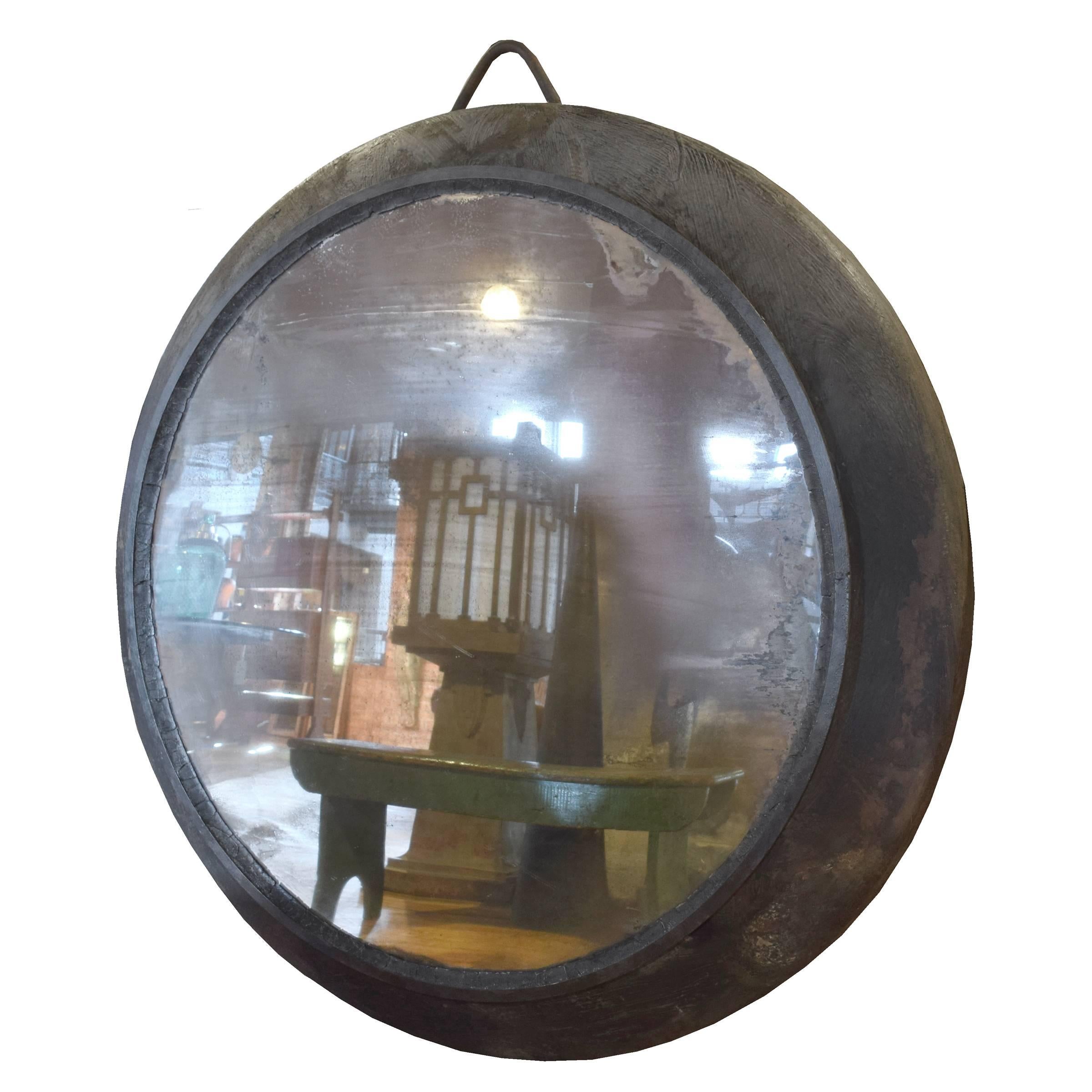 A fantastic large Czech Republic convex mirror in an iron frame with a great patina.