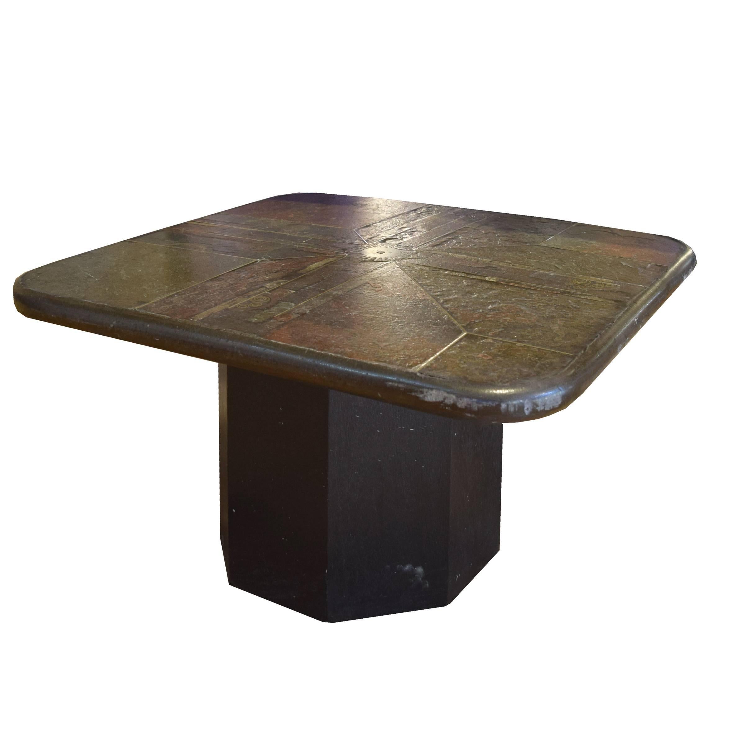 A great coffee table by Dutch artist Marcus Kingma with a mosaic stone top with brass inlaid details on a hexagonal wood base. Signed 'M. Kingma '90'.
 