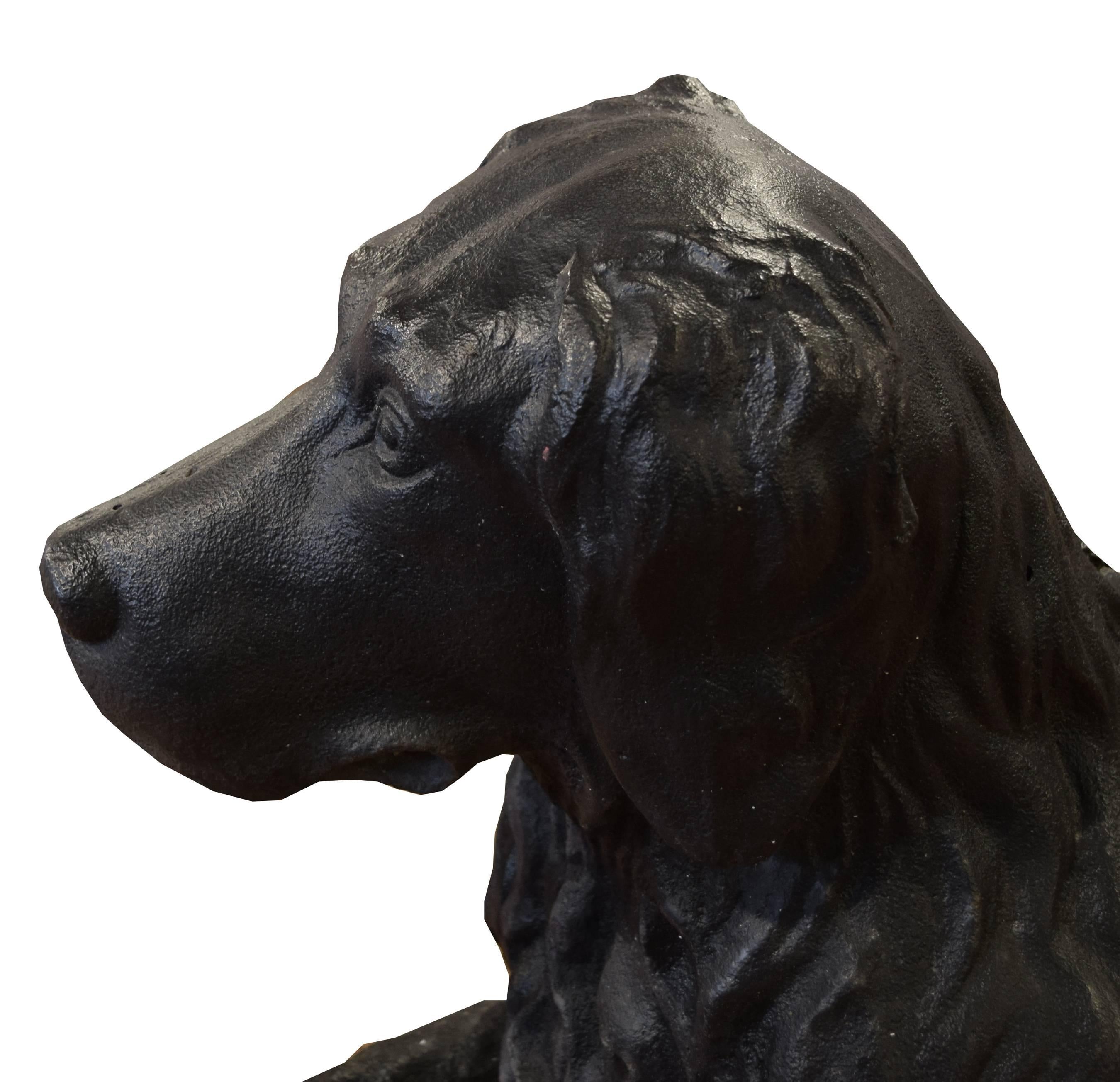 Painted Pair of J. W. Fiske & Co. Newfoundland Statues