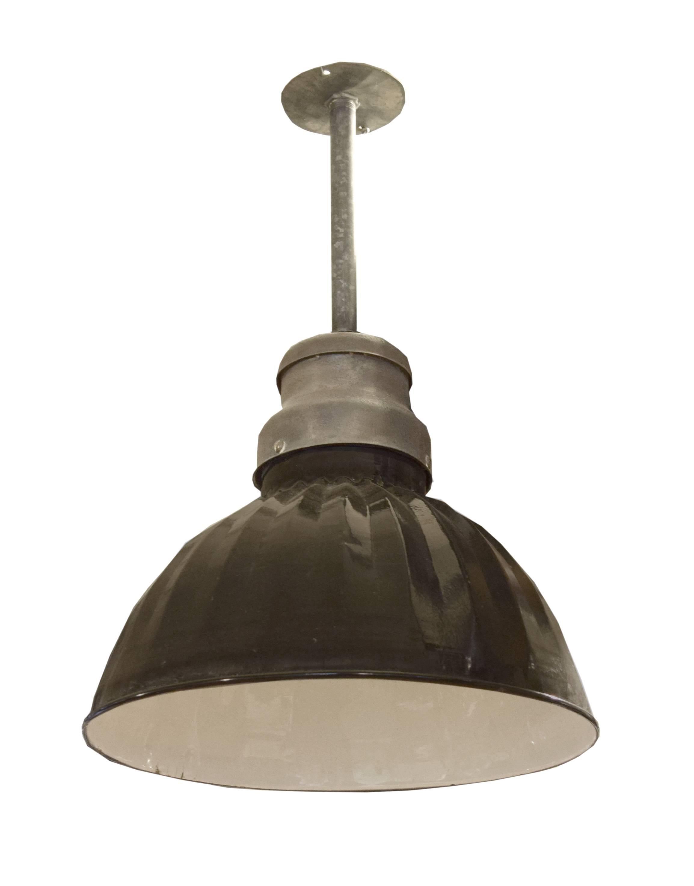 American Industrial pendant with a rare black enameled steel shade. In original condition.

Needs to be re-wired.