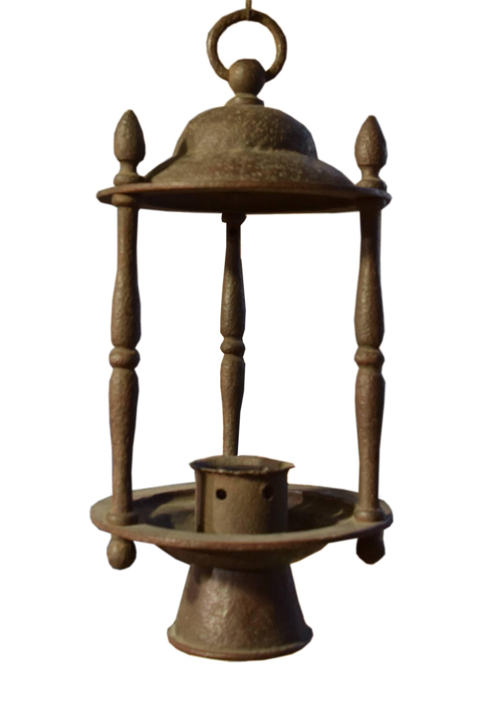 A wrought iron lantern, circa 1930, with a fantastic twisted iron chain from the estate of Jose´ Thenee in Argentina. Thenee is considered one of the greatest blacksmiths and won a world title in 1923.

Measures: 70