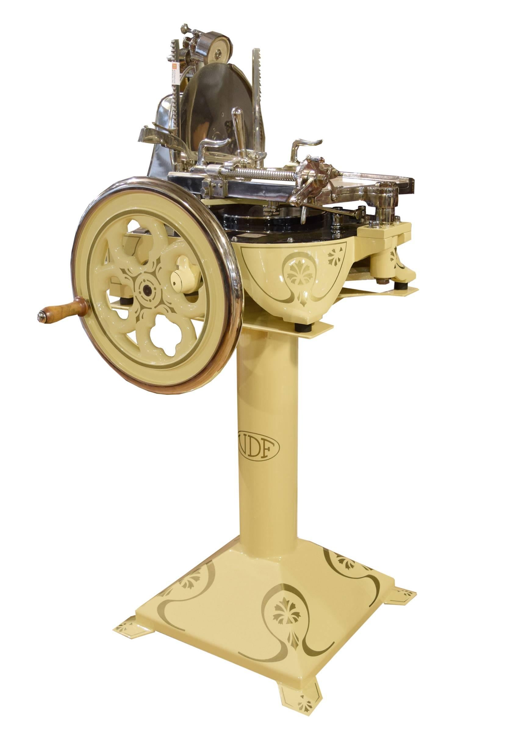 An extremely rare Burgers VDF prosciutto slicer with hand-painted pin striping and lettering, from Deventer, Netherlands. With its precision blade, this flywheel operated machine cranks out prosciutto slices thin enough to see through. Henricus
