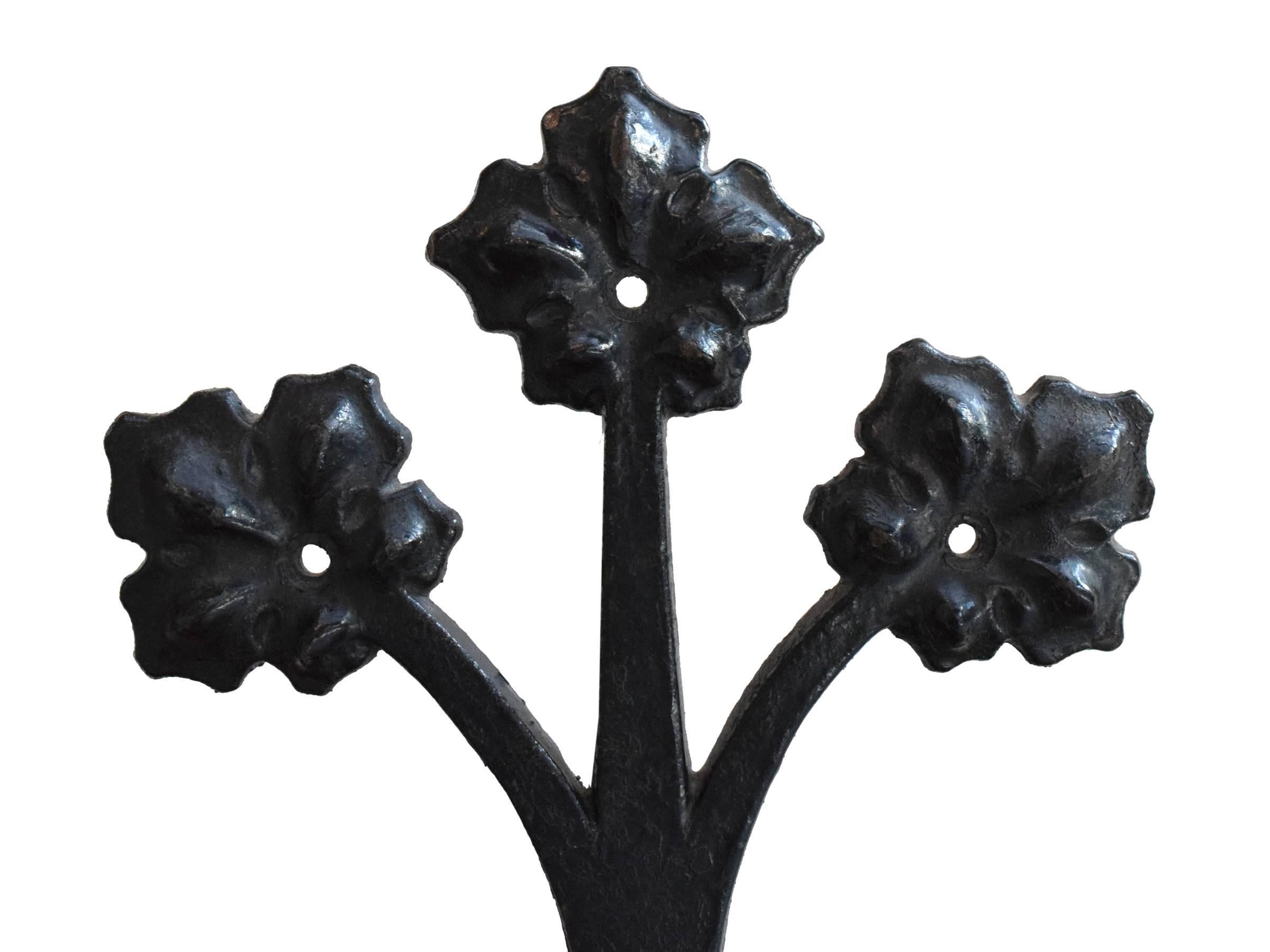 An American bronze decorative hinge with beautiful scrolling ivy motif, mounted on a custom stand.