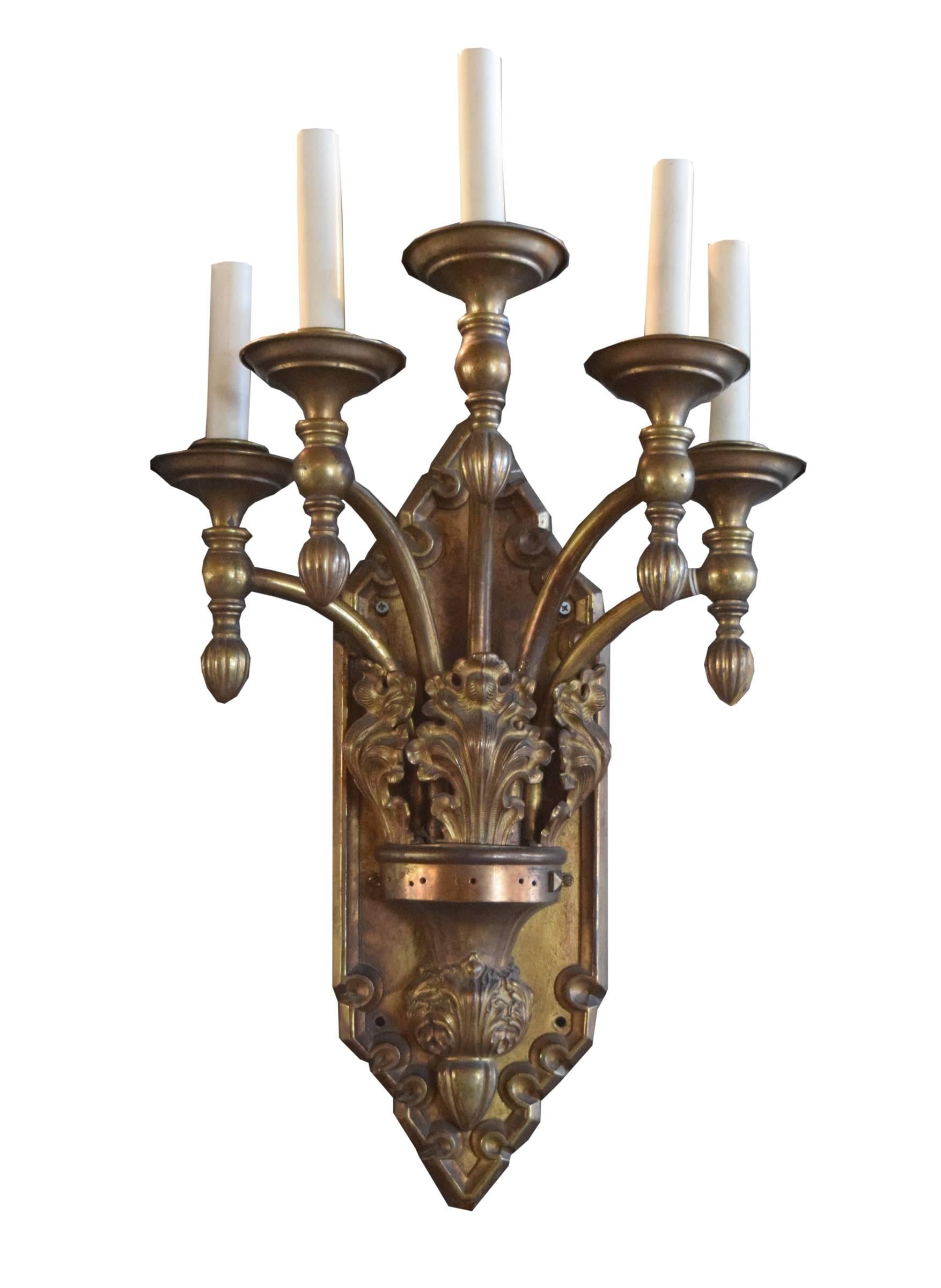 A pair of great quality bronze American sconces, each with five curved arms, acanthus leaf detail, and a fabulous back plate, circa 1920. Need to be re-wired.