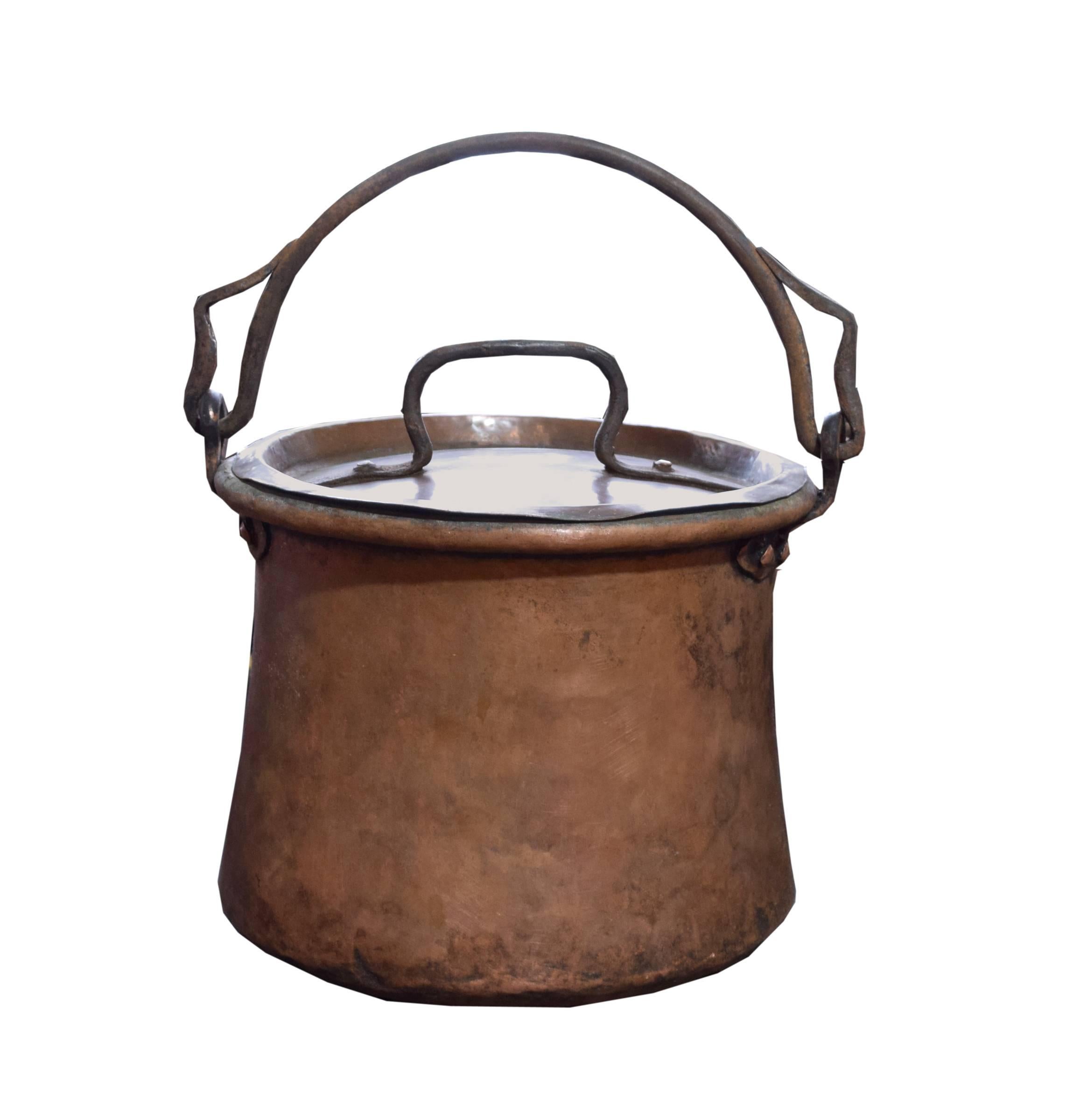 19th century Italian copper cooking vessels in graduated sizes with iron handles.
Priced individually.

Measures: 12