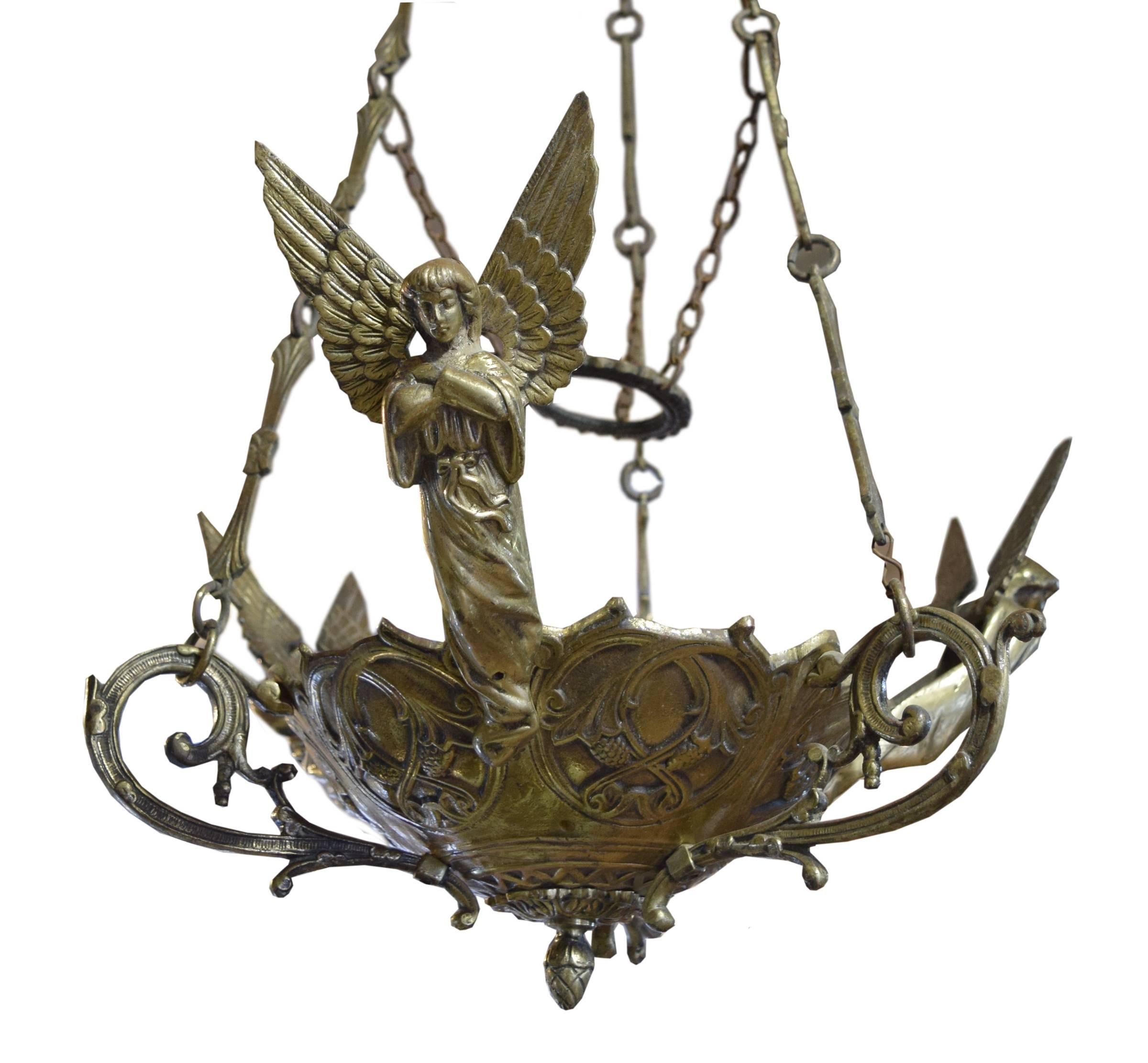 A bronze argentine hanging sanctuary lamp with a highly detailed cast bowl with three angels, circa 1900.